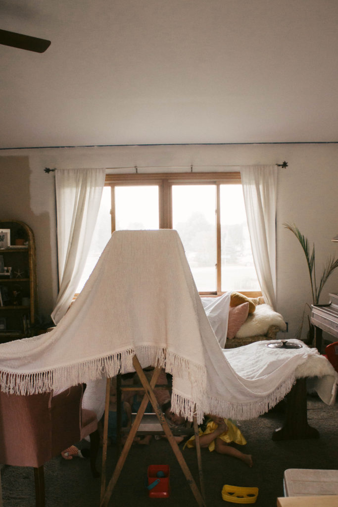 We had a cold rainy summer day so we built a fort and had a pear picnic