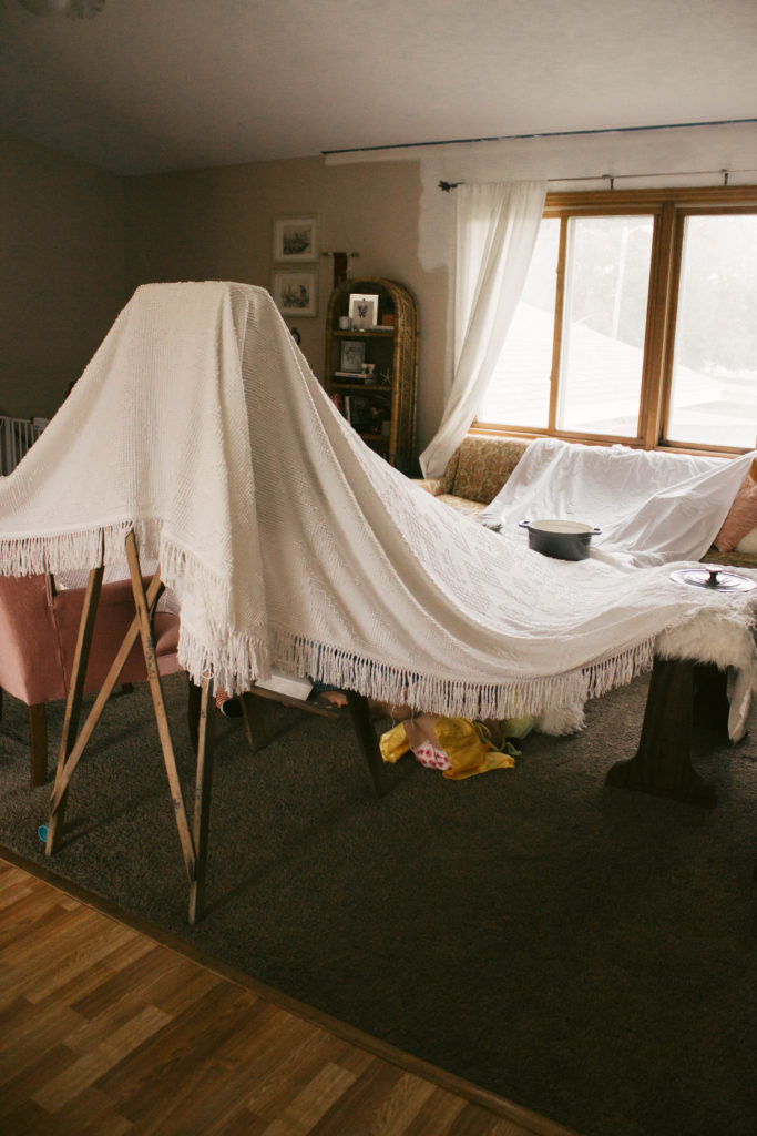 We had a cold rainy summer day so we built a fort and had a pear picnic