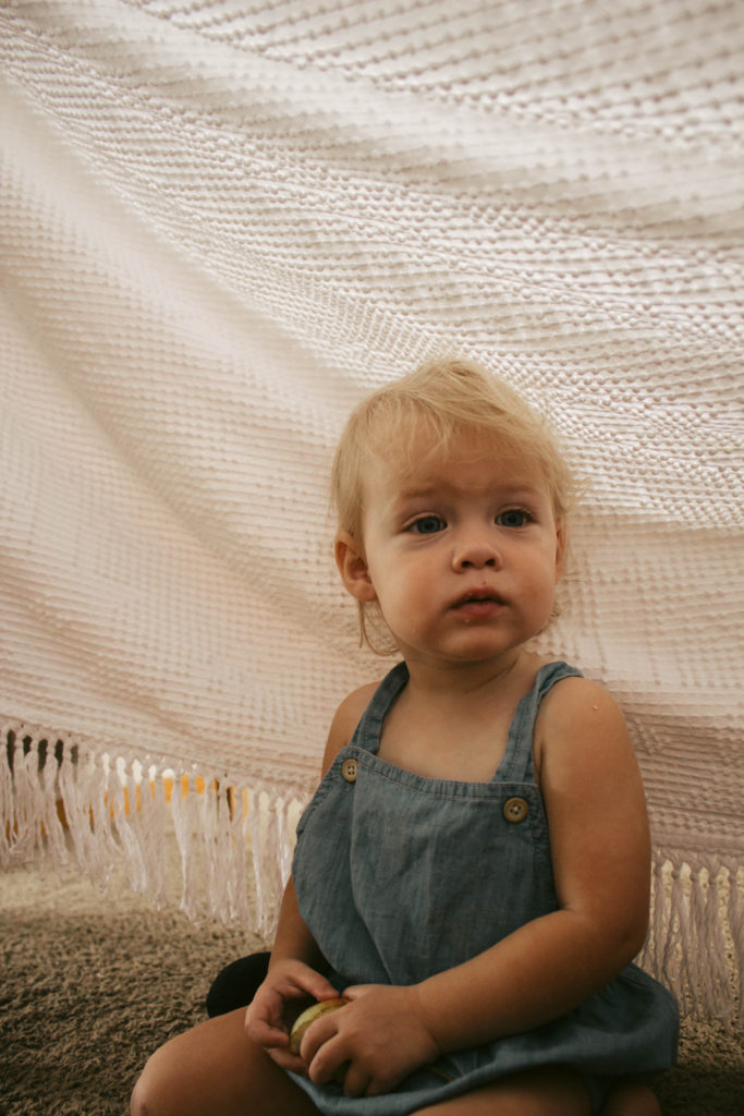 We had a cold rainy summer day so we built a fort and had a pear picnic