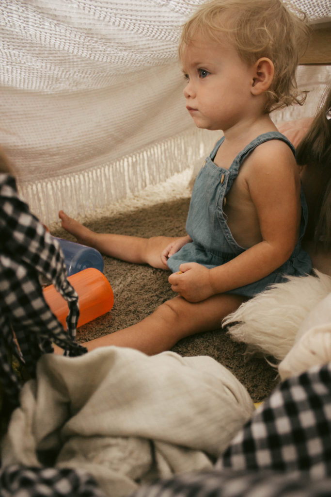 We had a cold rainy summer day so we built a fort and had a pear picnic