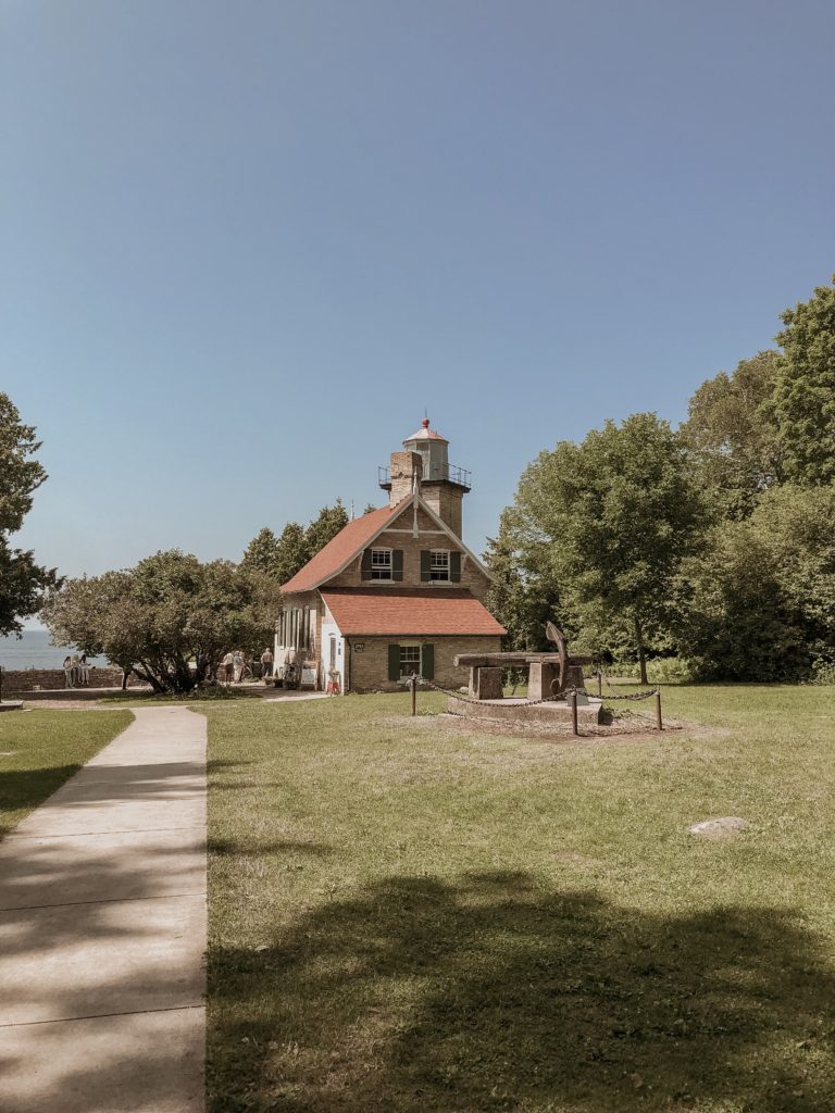 view of the lighthouse in peninsula state park in door county wisconsin