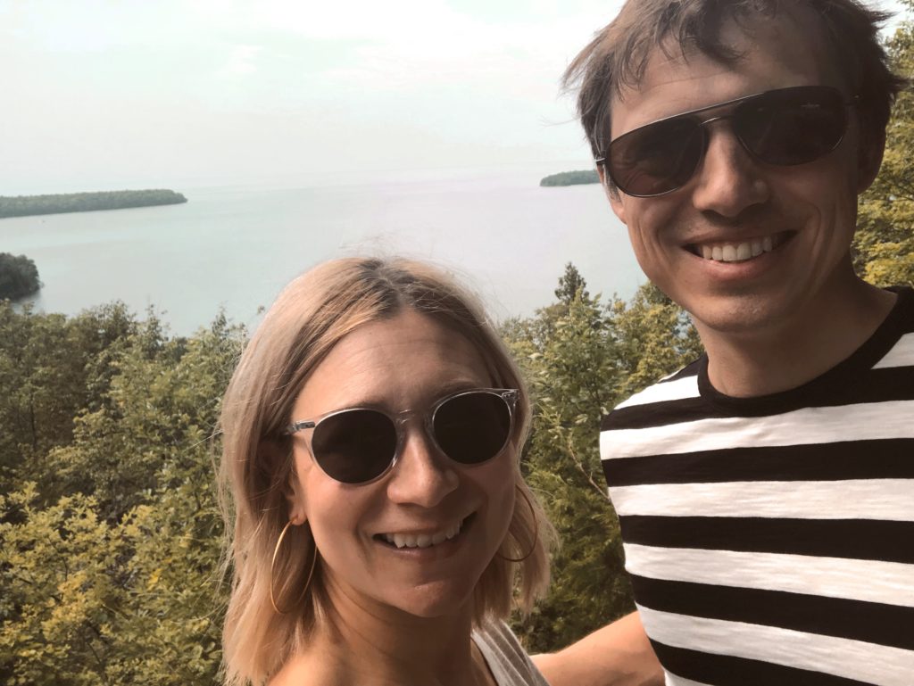 taking a selfie in peninsula state park, clear frame glasses from glasses USA, prescription sunglasses, everlane men's tee, black and white striped tee
