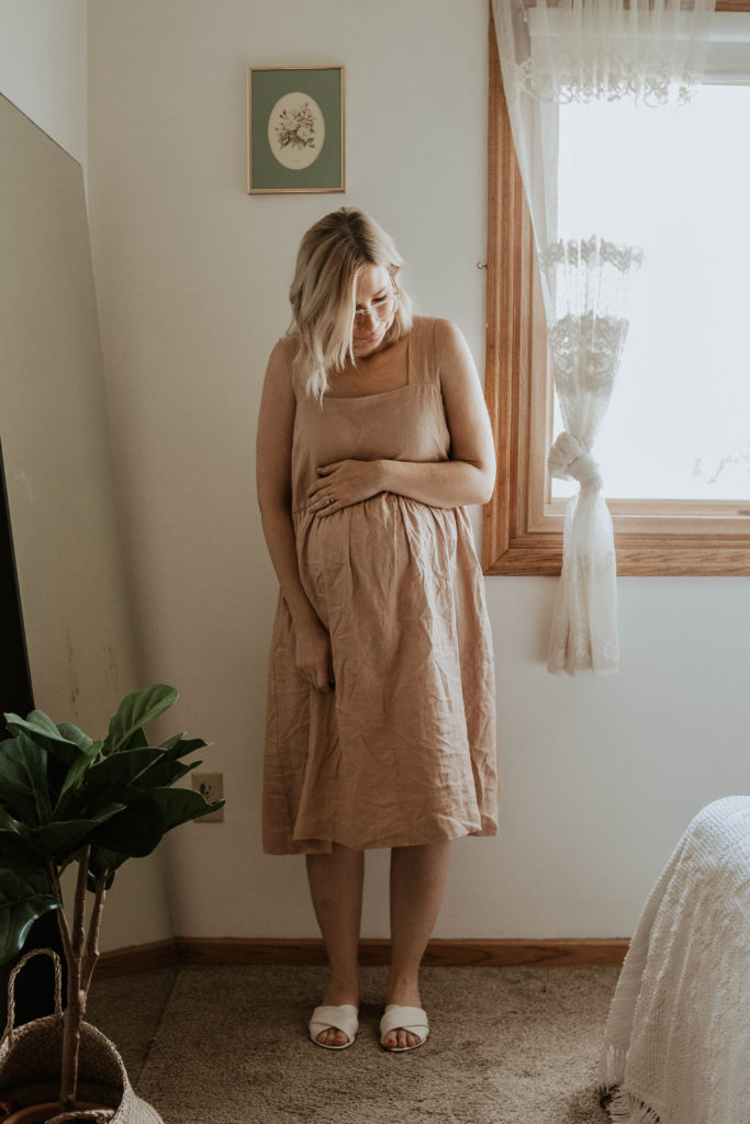 dressing for comfort, blush linen dress, white sandals, linen maternity dress