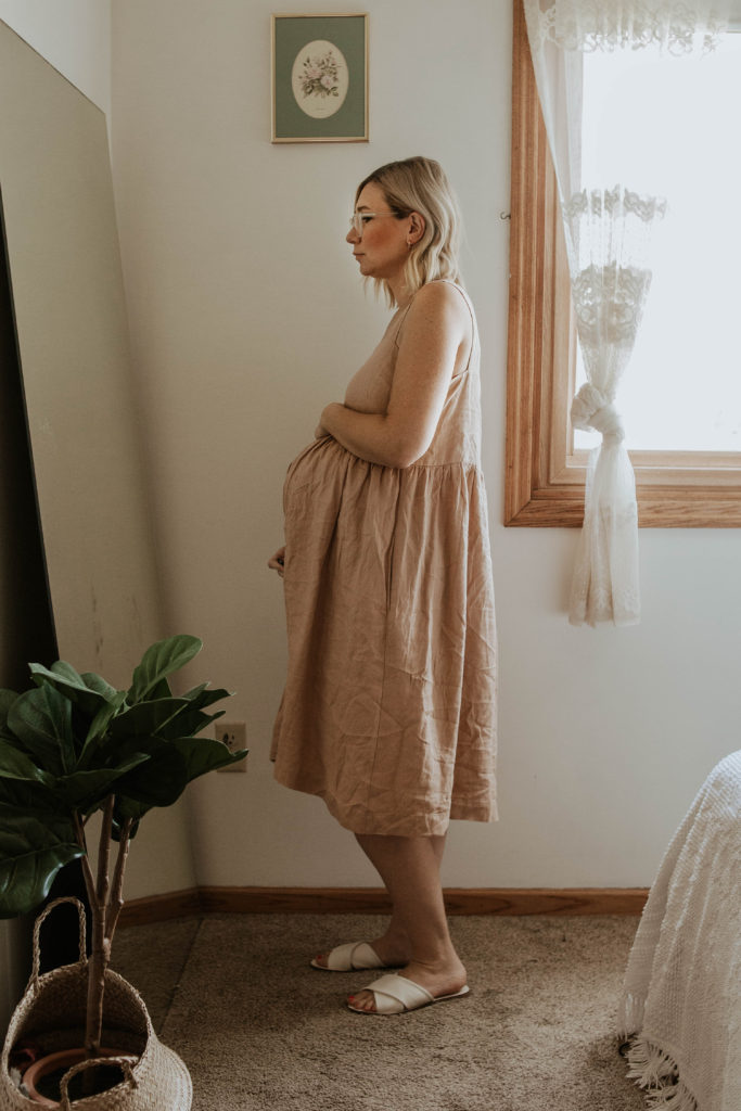 dressing for comfort, blush linen dress, white sandals, linen maternity dress