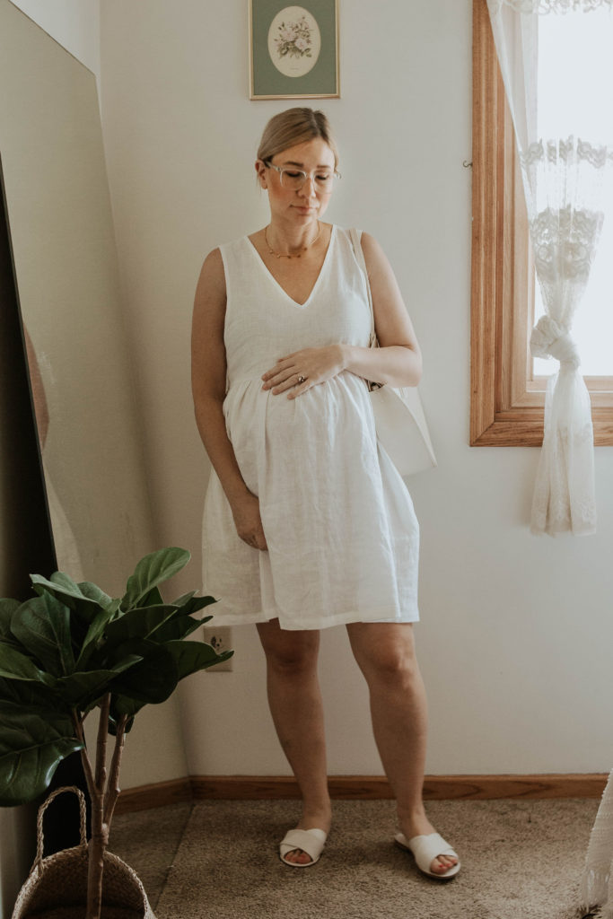dressing for comfort, white linen dress, white sandals, white circle bag, linen maternity dress