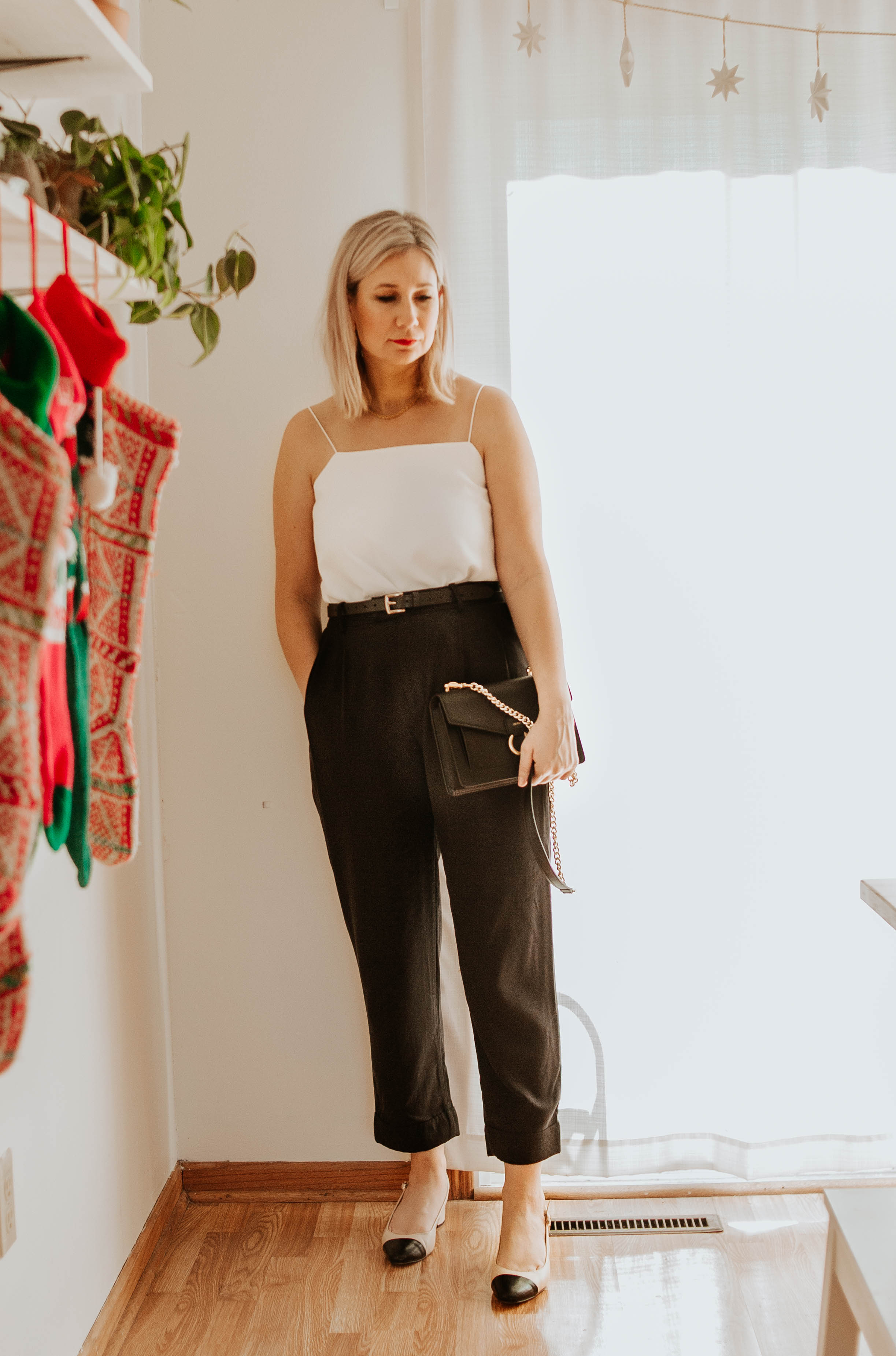Mini Holiday Lookbook Featuring Ethical Fashion, white cami, black trousers, everlane pleat pants, everlane goweave black chain bag, cap toe slingbacks, chanel slingbacks