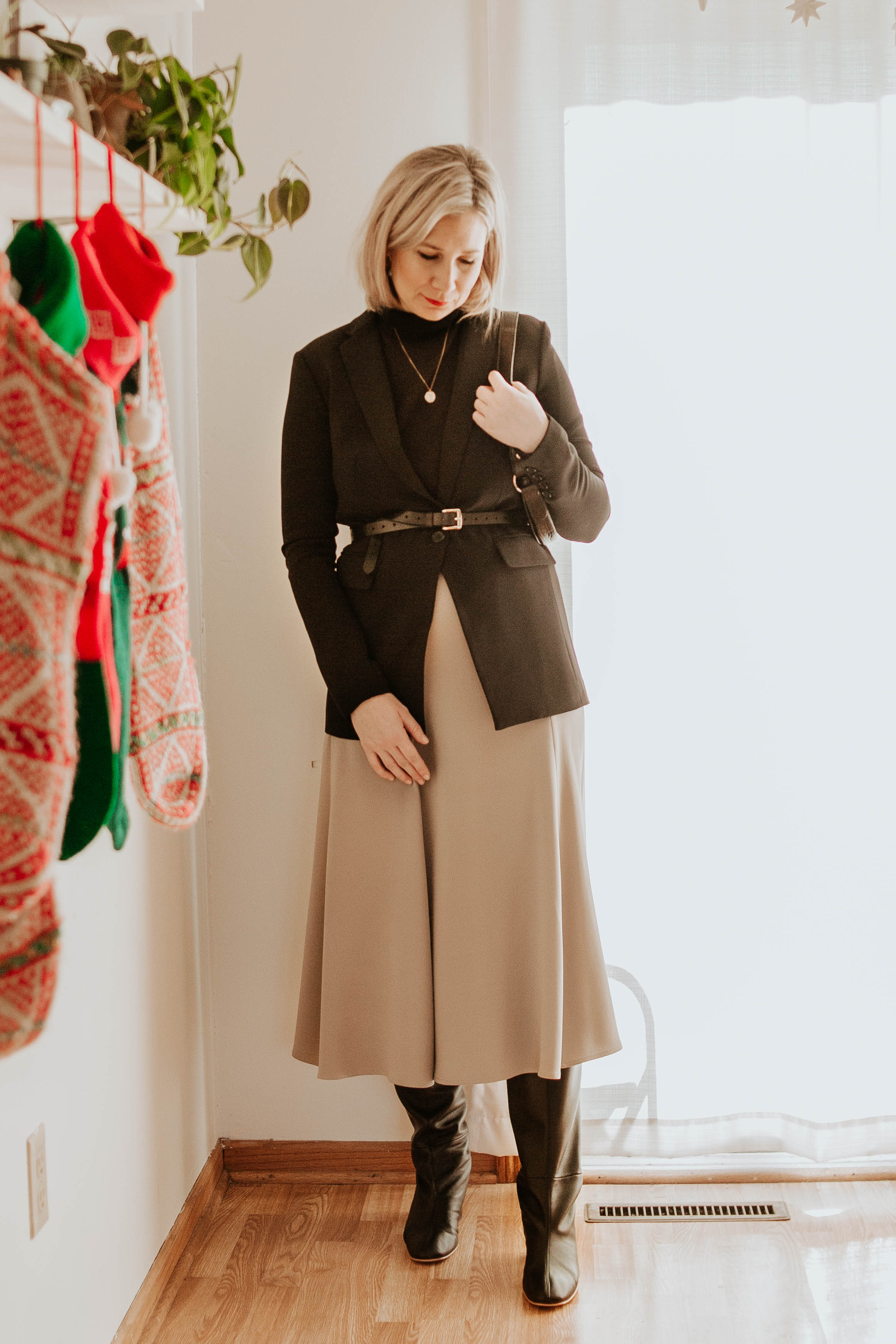 Mini Holiday Lookbook Featuring Ethical Fashion, black turtleneck sweater, brass blazer, black blazer, belted blazer, taupe silk skirt, bias cut silk skirt, black knee high boots, everlane knee high boots