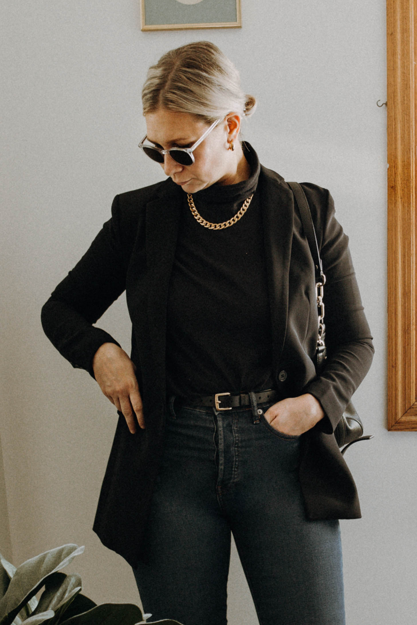 A Week of Casual Chic Outfits: What I Wore in a Week, brass black blaer, everlane black turtleneck, everlane cigarette jeans, everlane loafers, clear rimmed sunglasses, gold chain, kate spade jackson purse