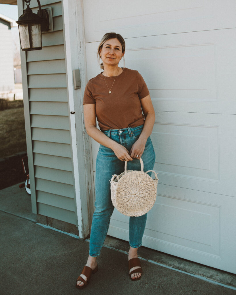 So here's what I actually wore this week, michael stars camel colored tee, levi skinny straight jeans, circle straw bag, m. gemi trunk leather sandal