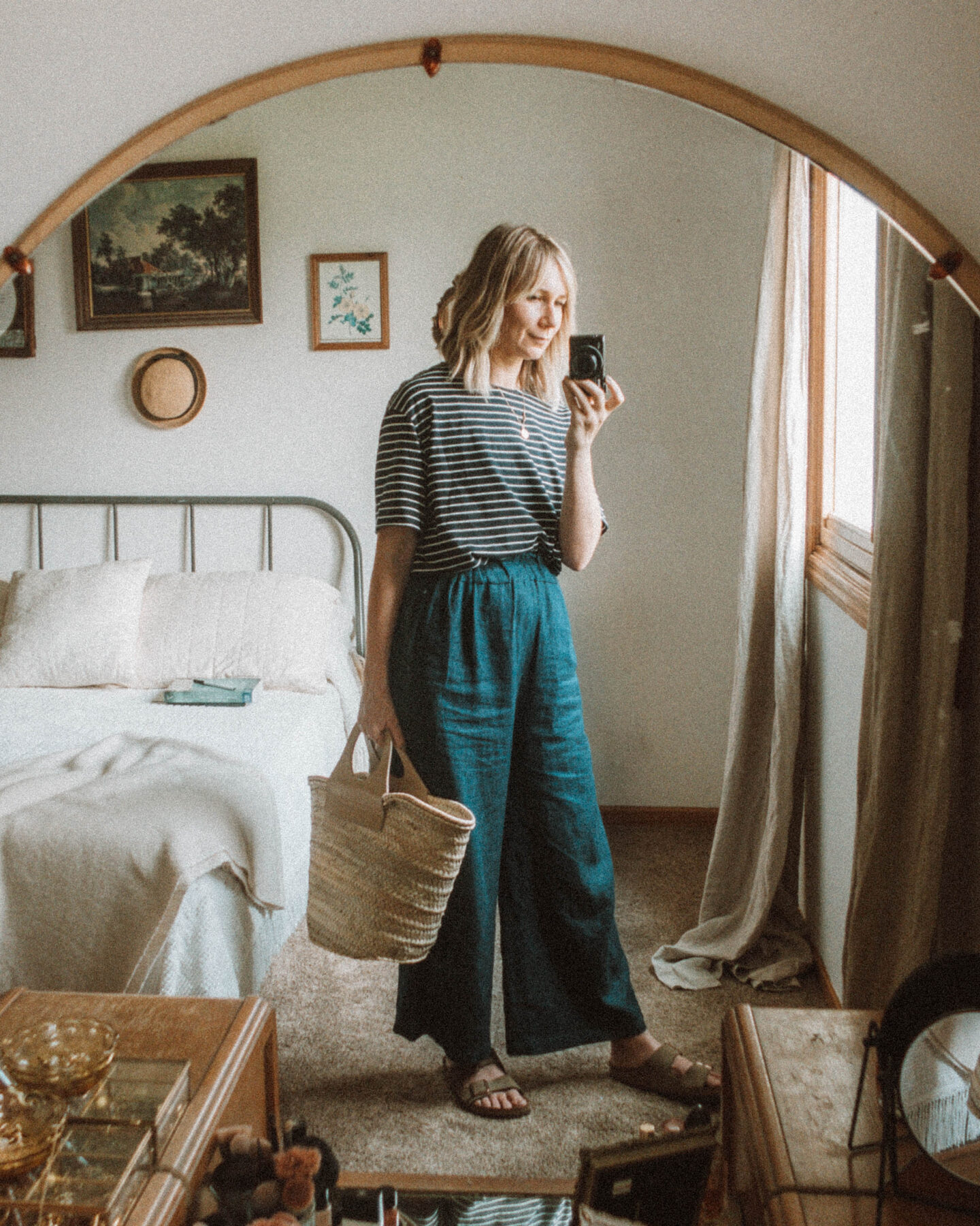 What I Wore this Week: From Tank Tops to Trench Coats, navy and white striped tee, denim wide leg pants, birkenstock arizona outfit, hereu basket bag