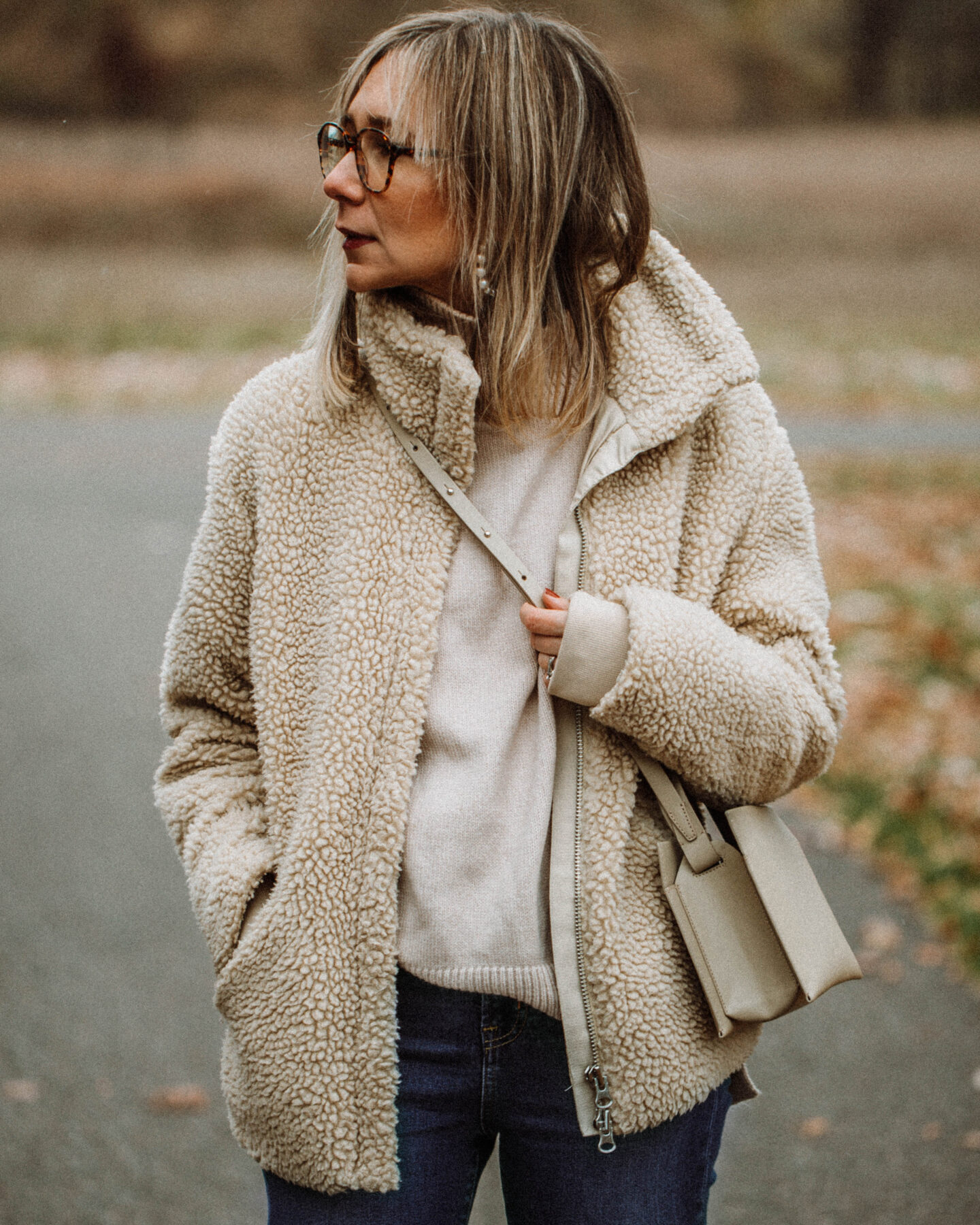 3 Cozy Outfits for Thanksgiving, Karin Emily Style - Faux Fur Sherpa Coat, Turtleneck Sweater, Mid Wash Skinny Jeans, Converse White Lug Sole High Tops