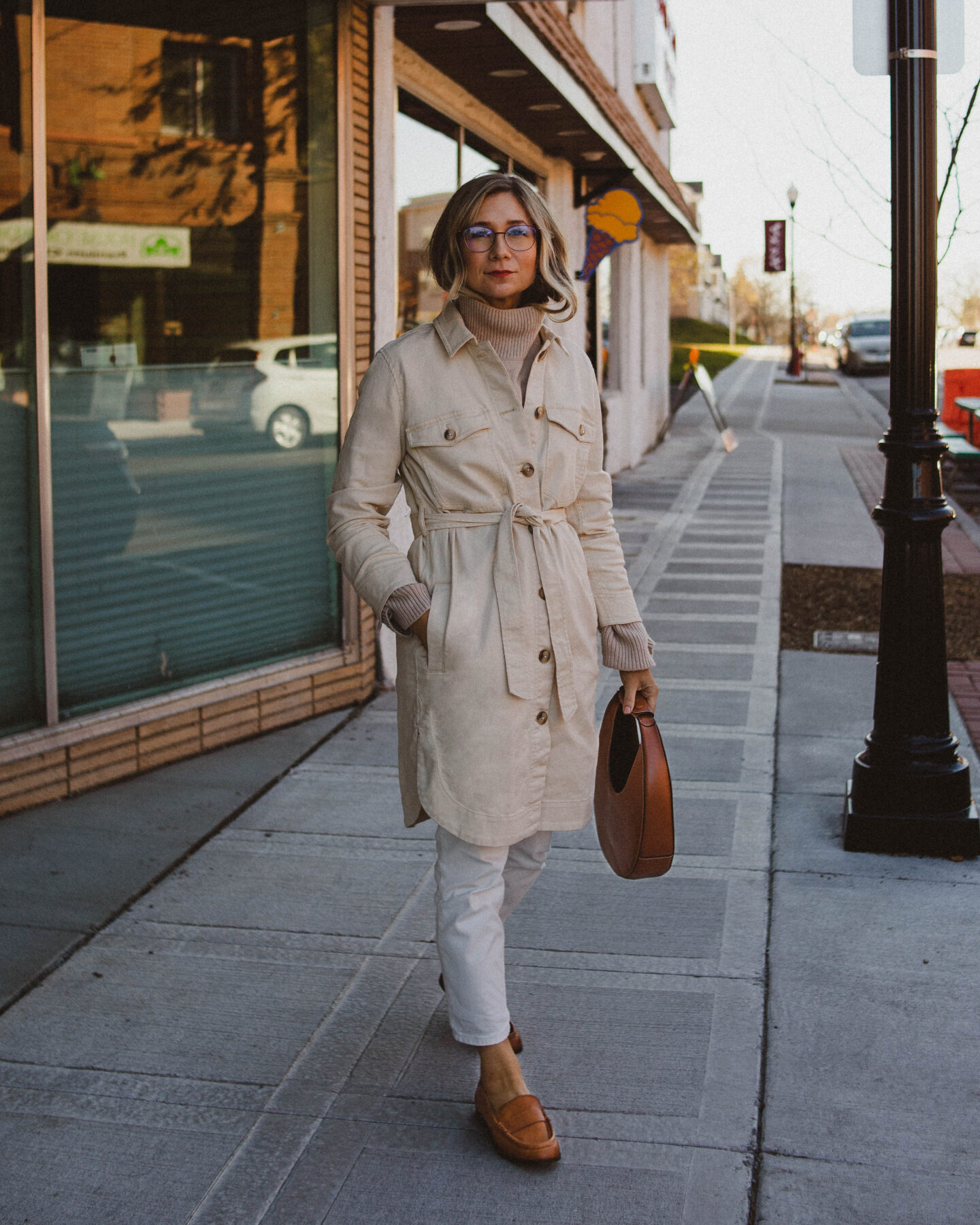 creamy neutrals, madewell chore coat, white jeans, brown loafers, staud moon bag