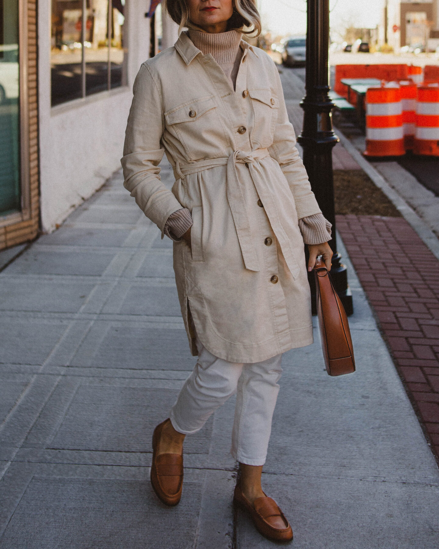 madewell chore coat, white jeans, brown loafers, staud moon bag