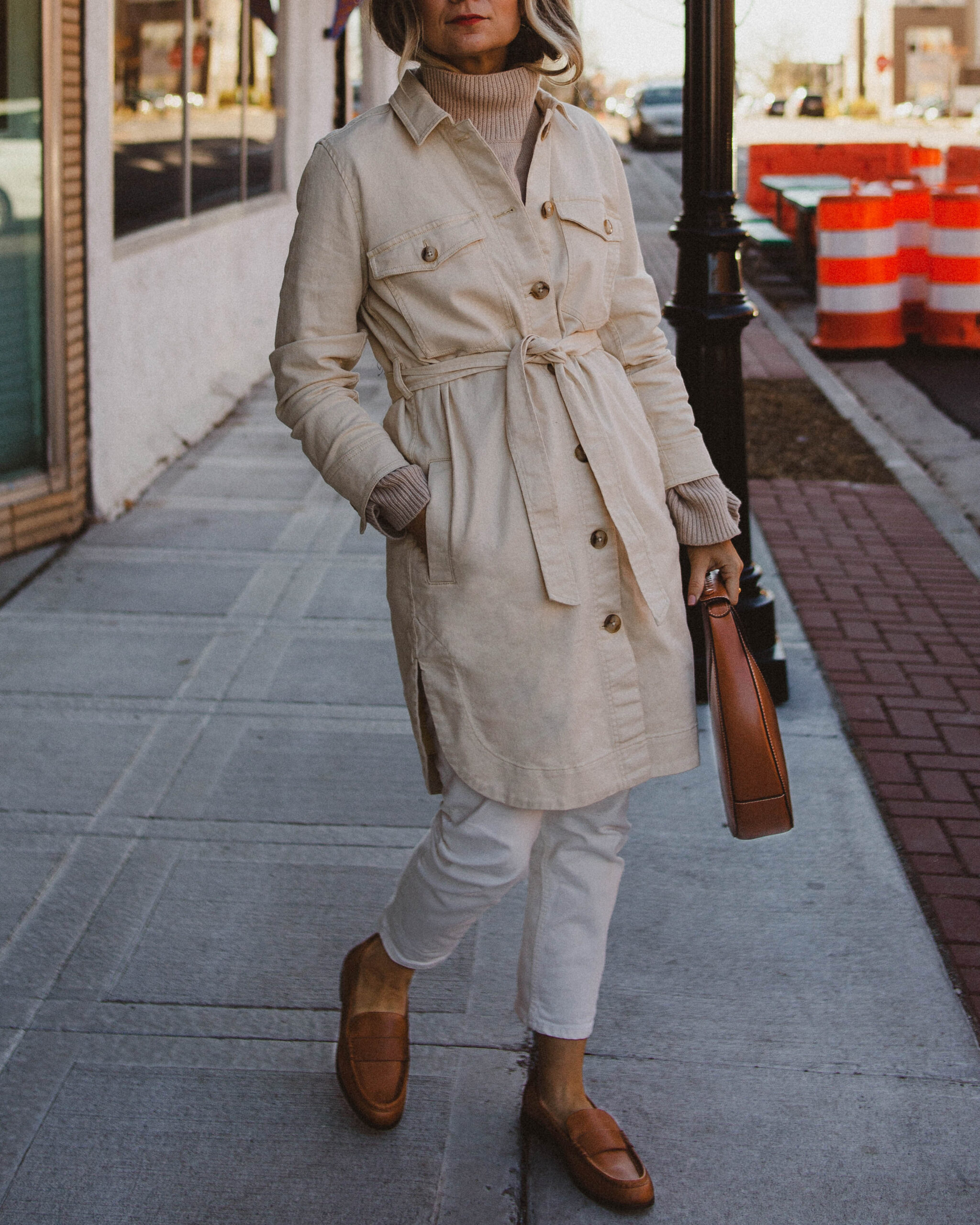 madewell chore coat, white jeans, brown loafers, staud moon bag