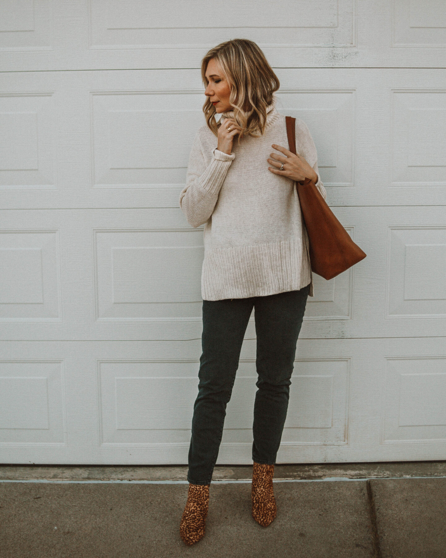 cozy, stay at home outfits, tunic turtleneck sweater, affordable mom jeans, leopard print boots, madewell transport tote