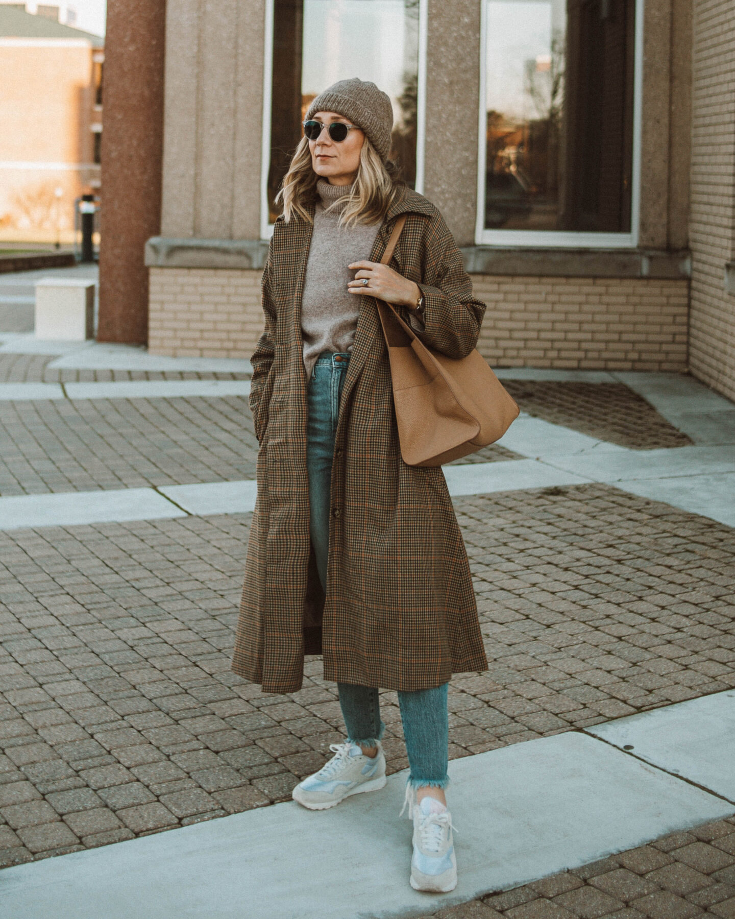cozy, stay at home outfits madewell perfect vintage jeans, toteme coat, toteme sweater, beige turtleneck sweater, white sneakers, plaid coat, cuyana hobo bag, brown toque