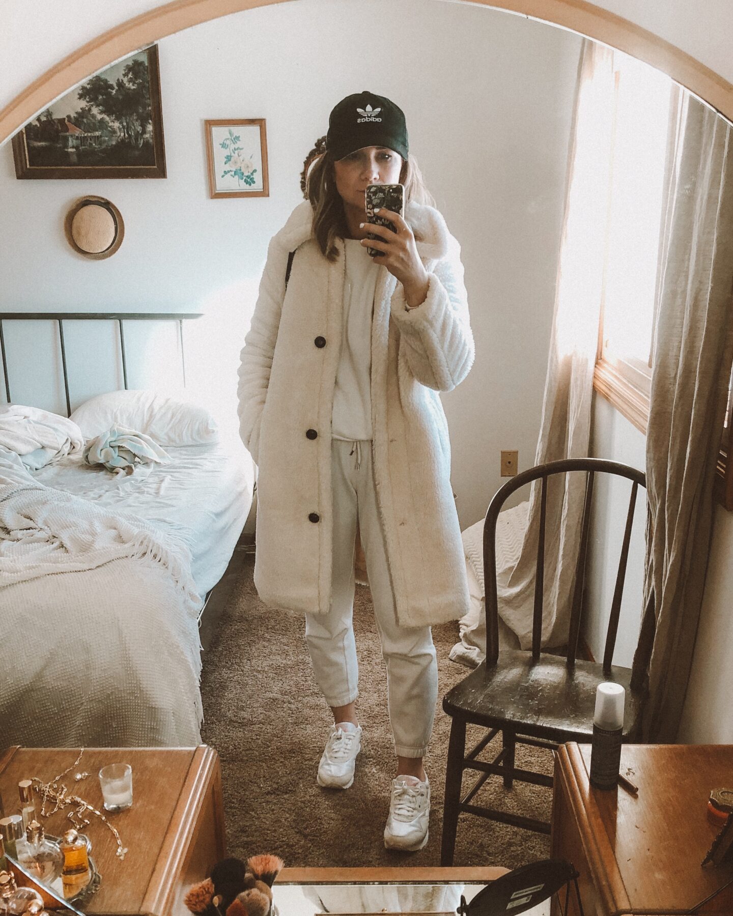 white jogger set, sherpa coat, black baseball cap, adidas hat