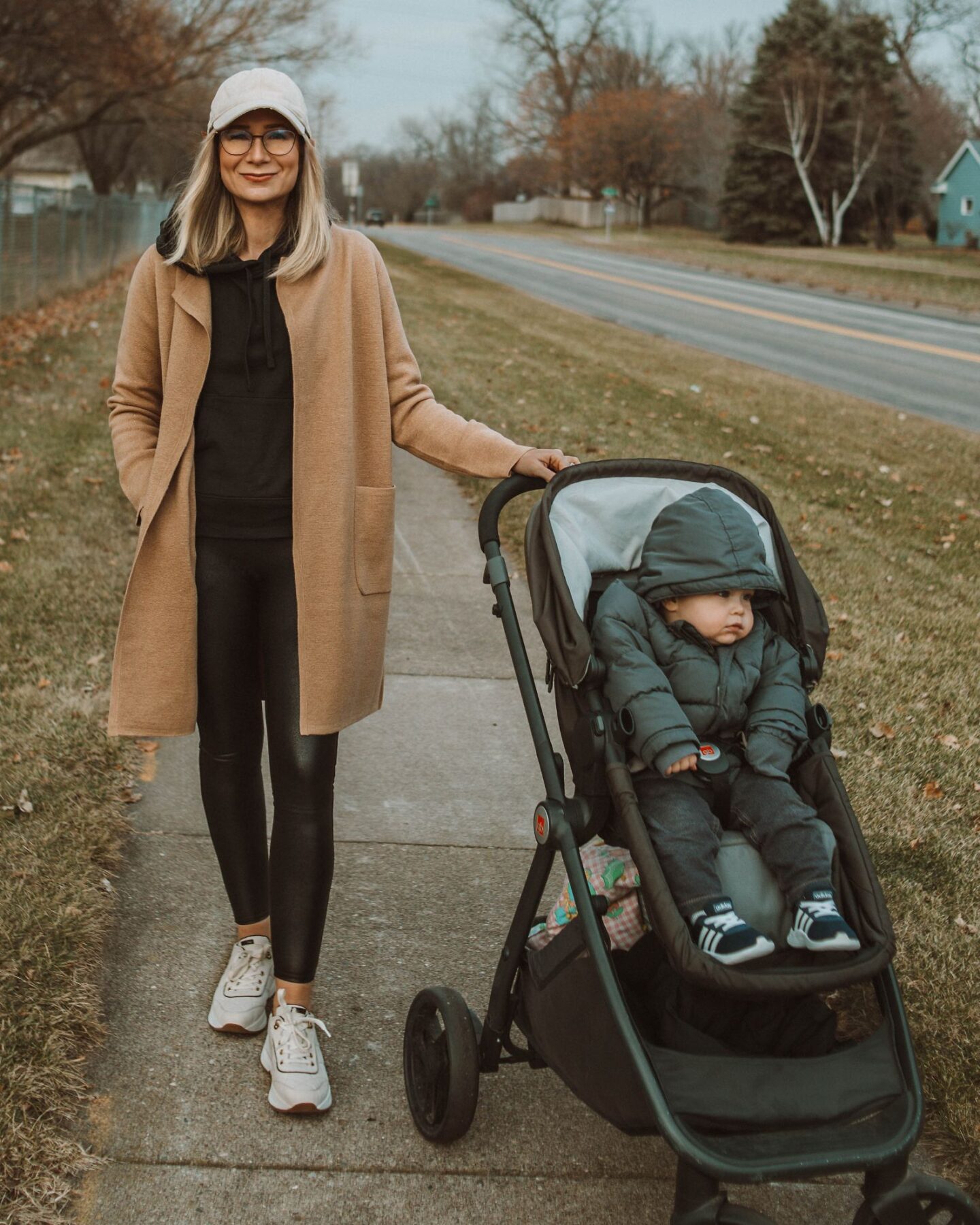 Karin Emily Style | Camel Sweater Coat, Faux Leather Leggings, Black Hoodie, Platform Leopard Sneakers