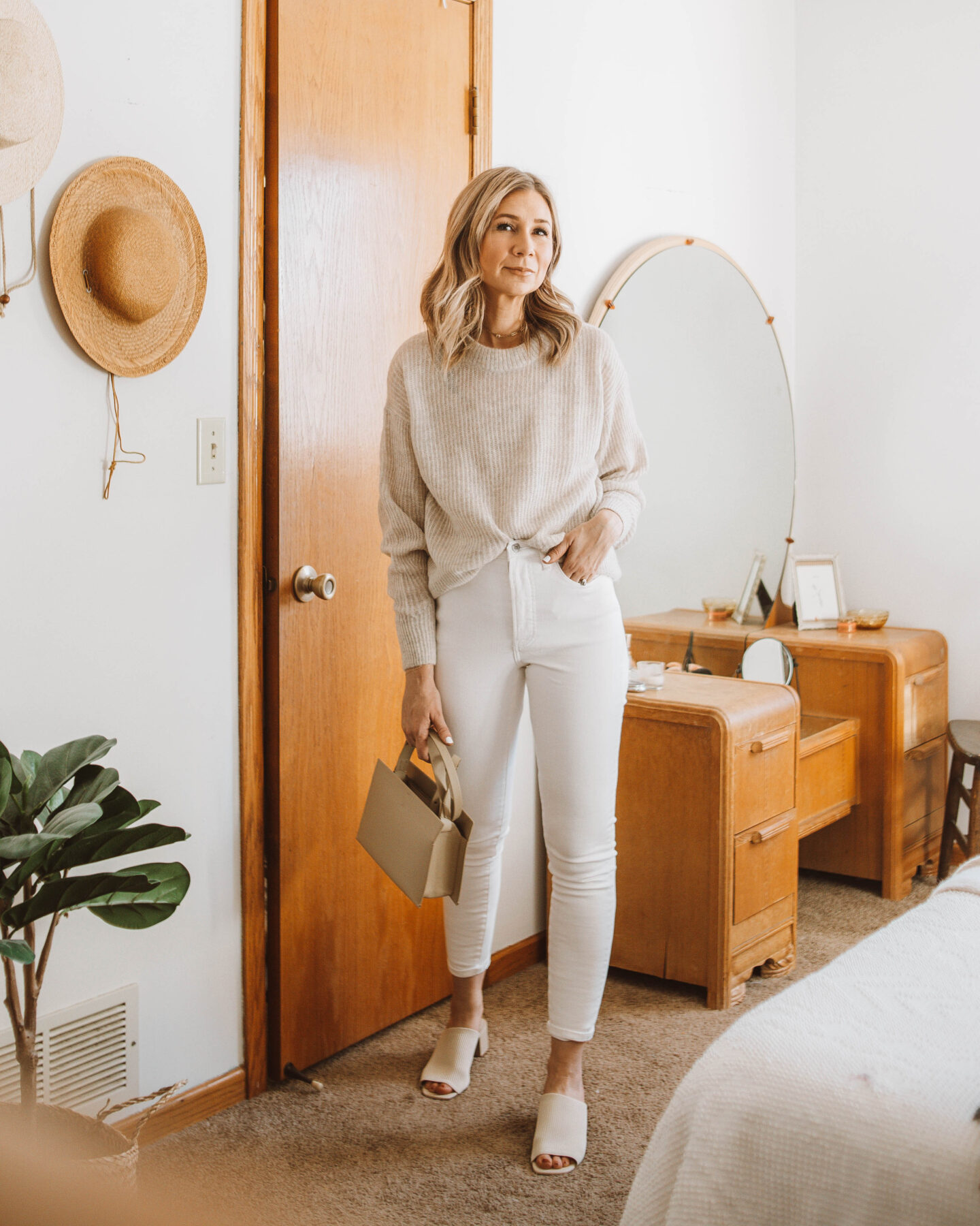 oatmeal sweater, white skinny jeans, nude heeled mules