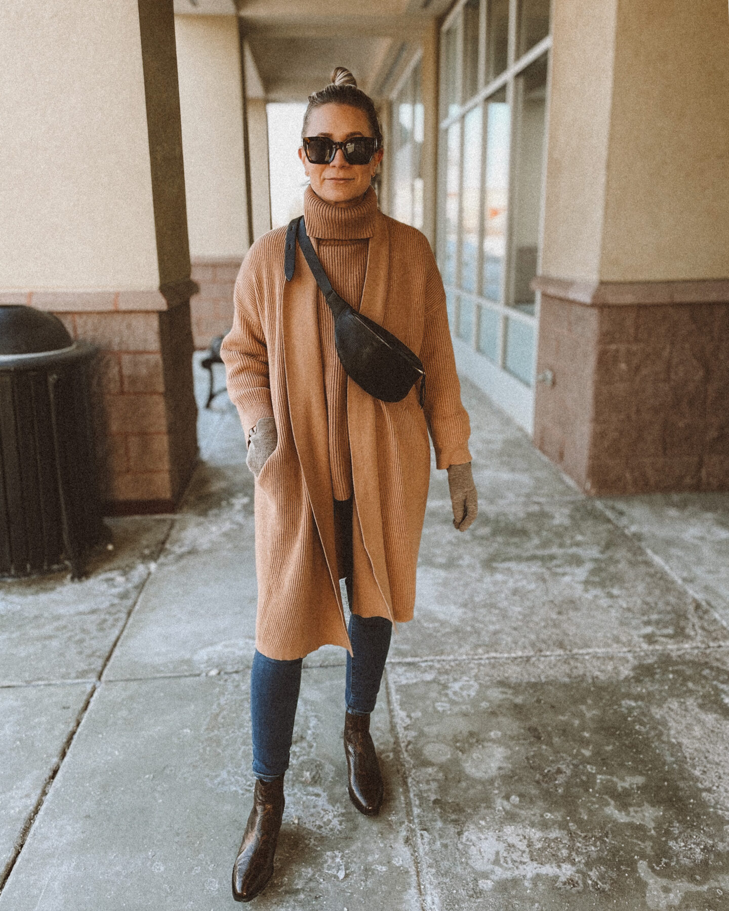 camel duster cardigan, camel turtleneck sweater, dark wash skinny jeans, snakeprint boots