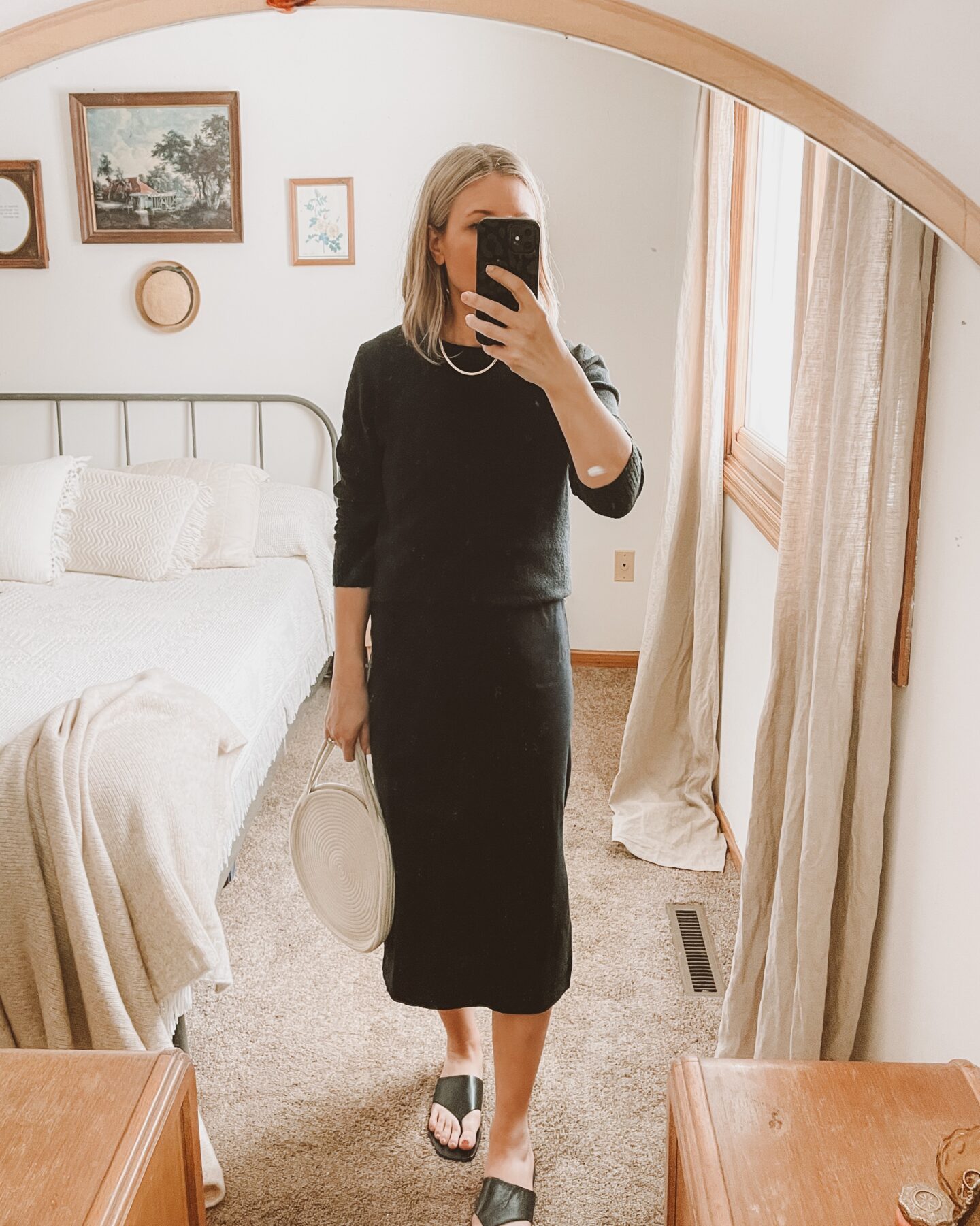 4 ways to style your favorite black midi dress