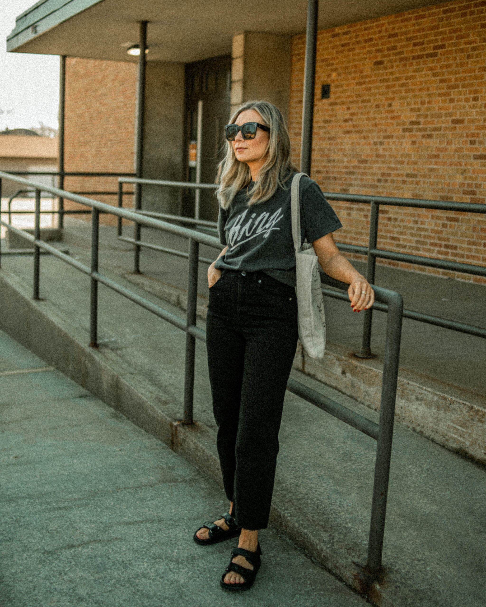 anine bing tee, graphic tee, everlane way high jeans, black high waisted jean, black straight leg jeans, chunky sandals, chanel lookalike sandals