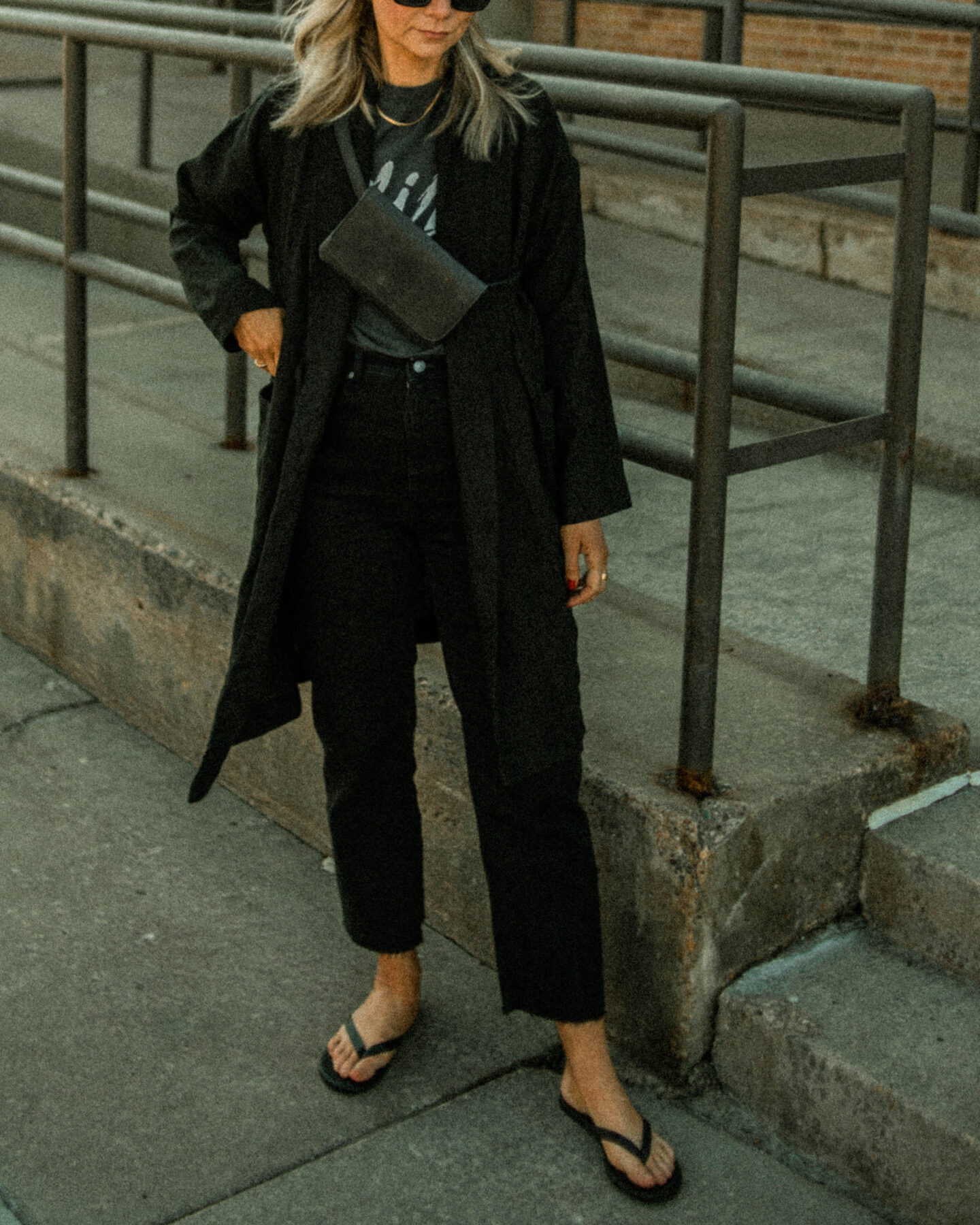 anine bing tee, graphic tee, everlane way high jeans, black high waisted jean, black straight leg jeans, black flip flops, black linen spring jacket