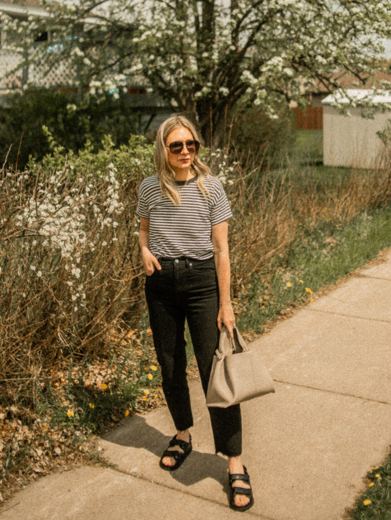 Striped Tee, Black Jeans, and Dad Sandals