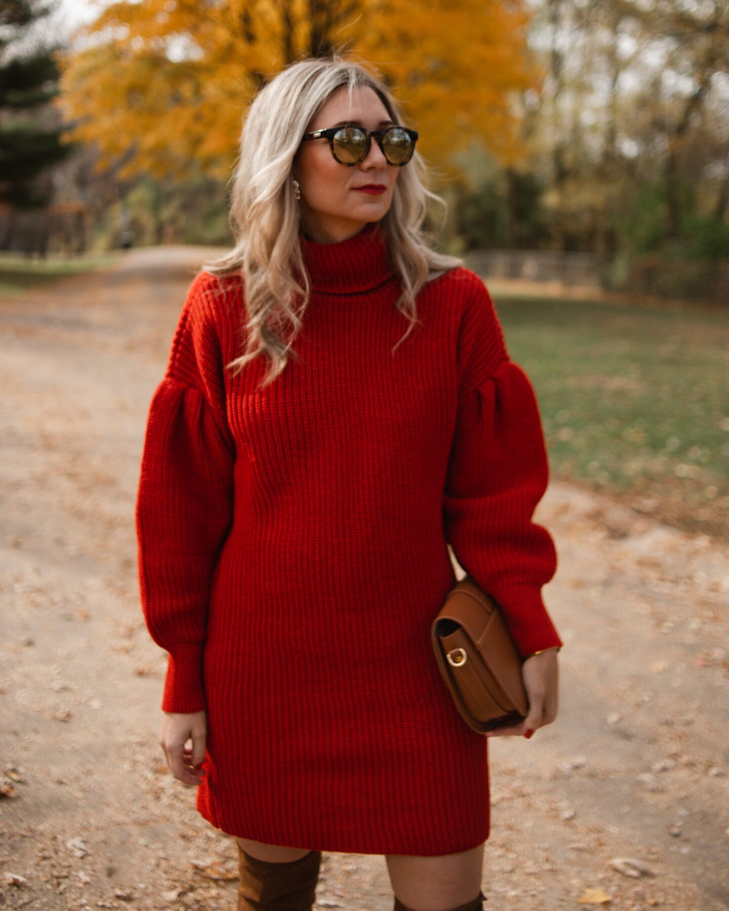 Karin Emily wears a red sweater dress from Free Assembly at Walmart 
