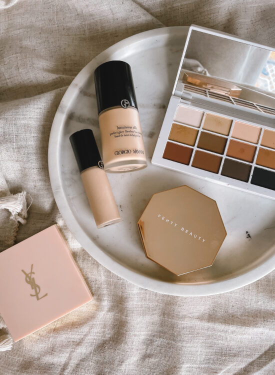 Karin Emily shares a flat lay of her favorite makeup products from the Sephora Holiday Savings Event