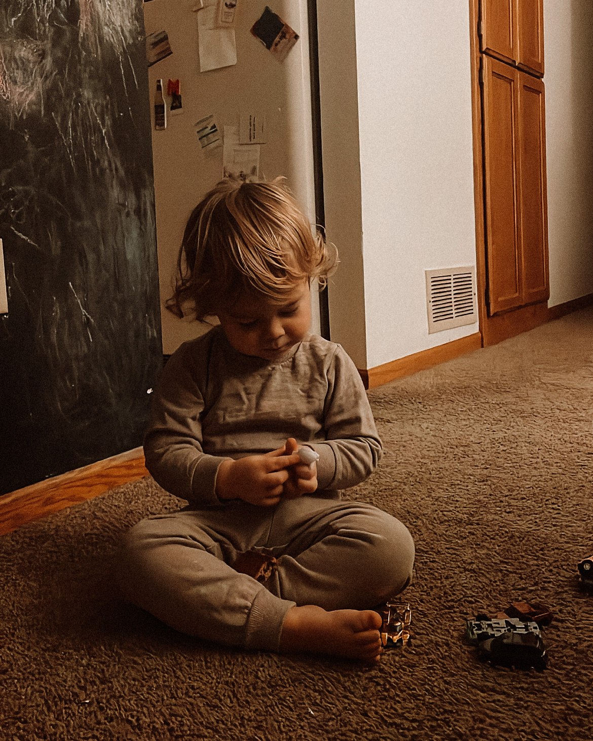 little boy with matching sweat pant set