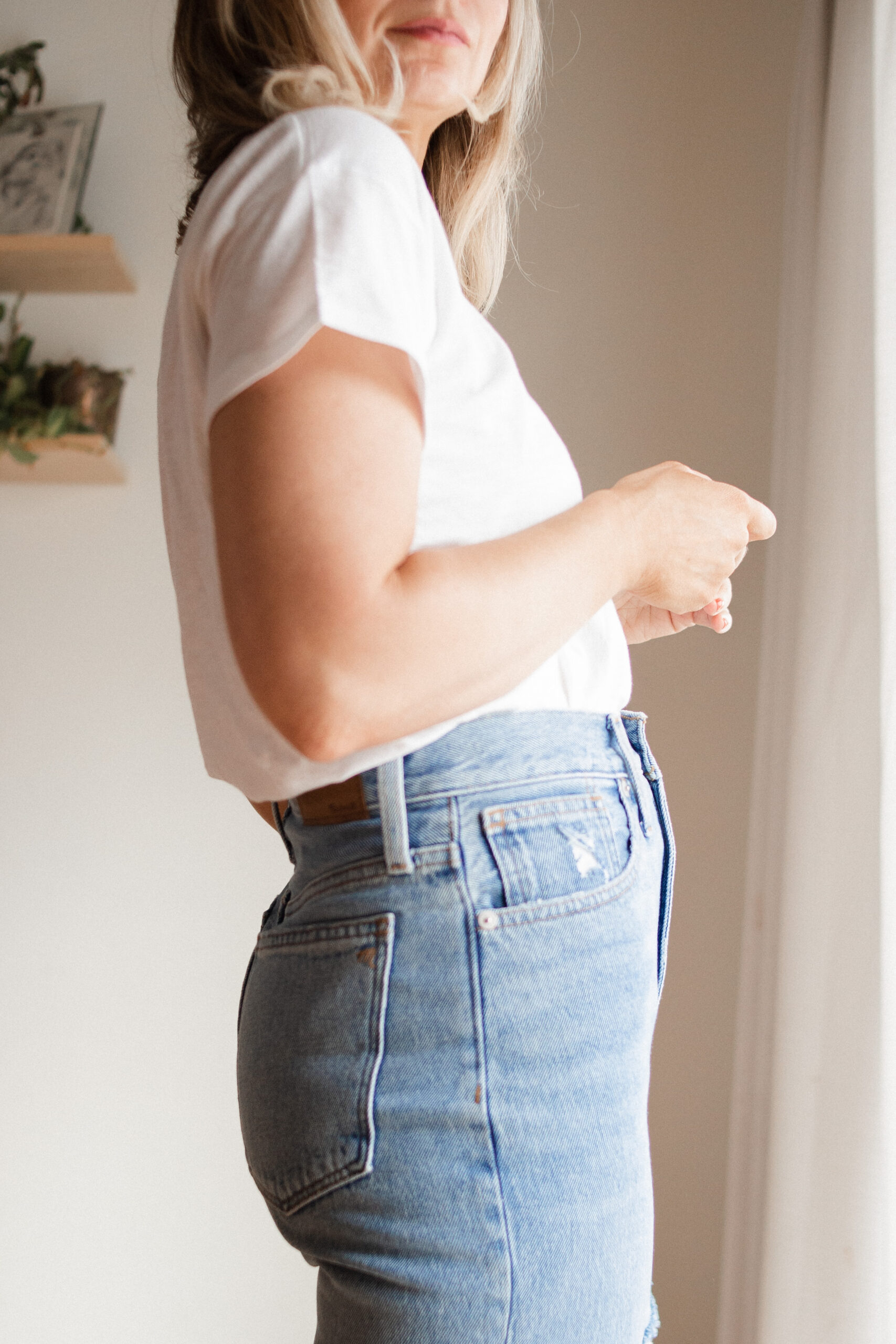 Karin Emily wears and reviews the Madewell perfect vintage wide leg jeans in her very detailed Madewell Denim Guide