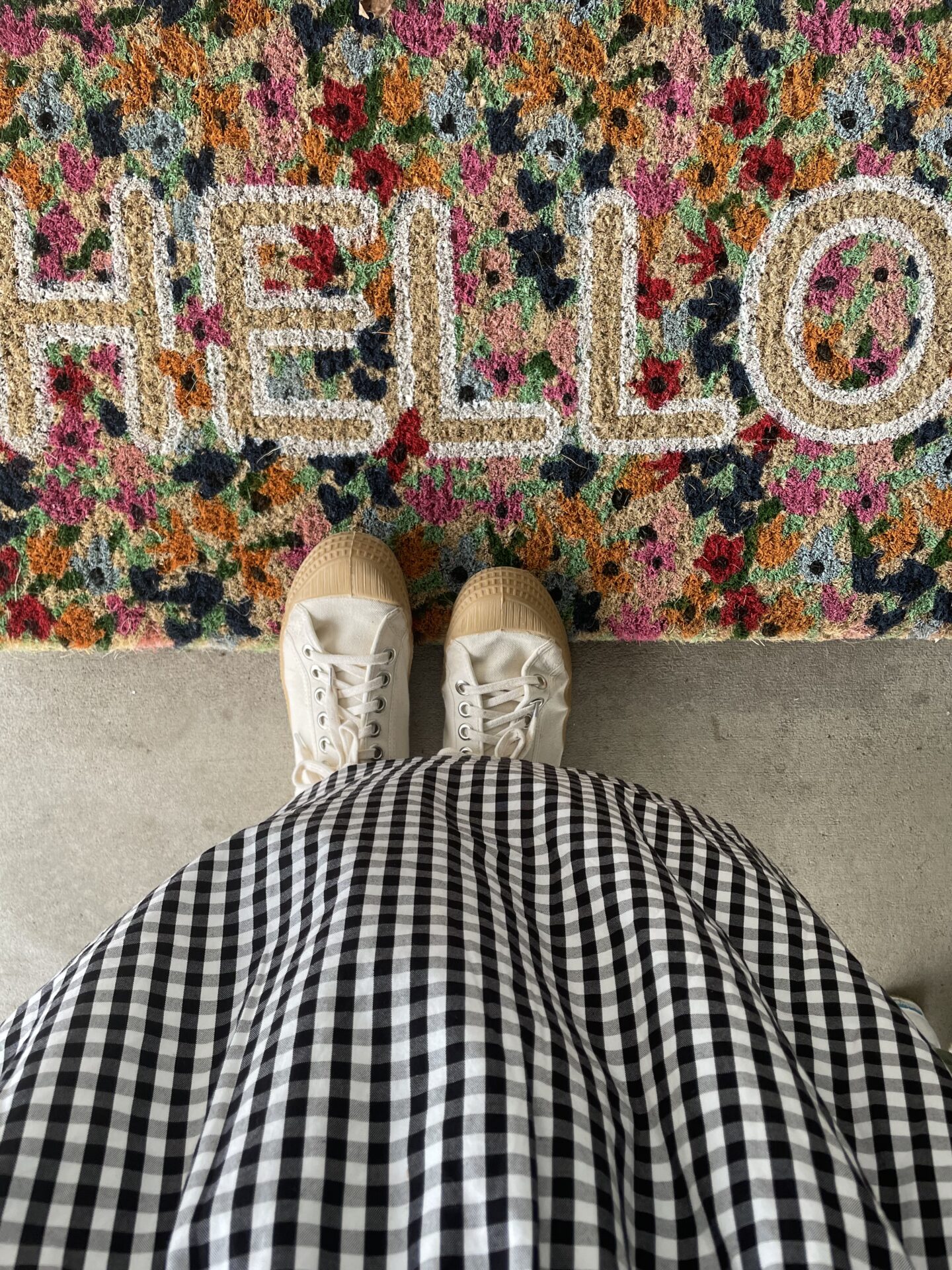 Karin Emily shares a floral hello door mat for her Mother's Day Gift Guide