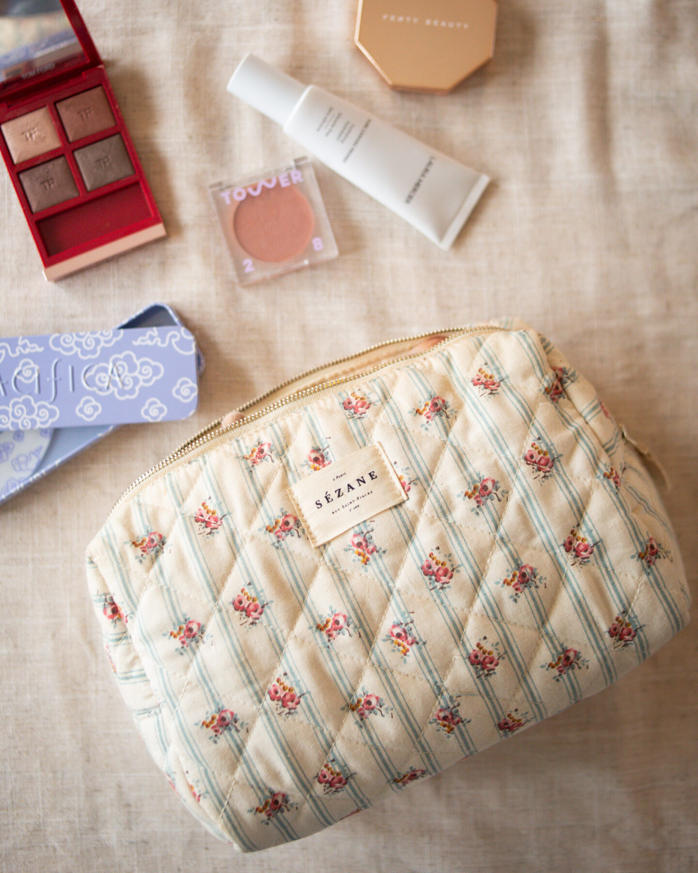 Karin Emily shares a quilted floral toiletry bag from Sezane for her Mother's Day Gift Guide