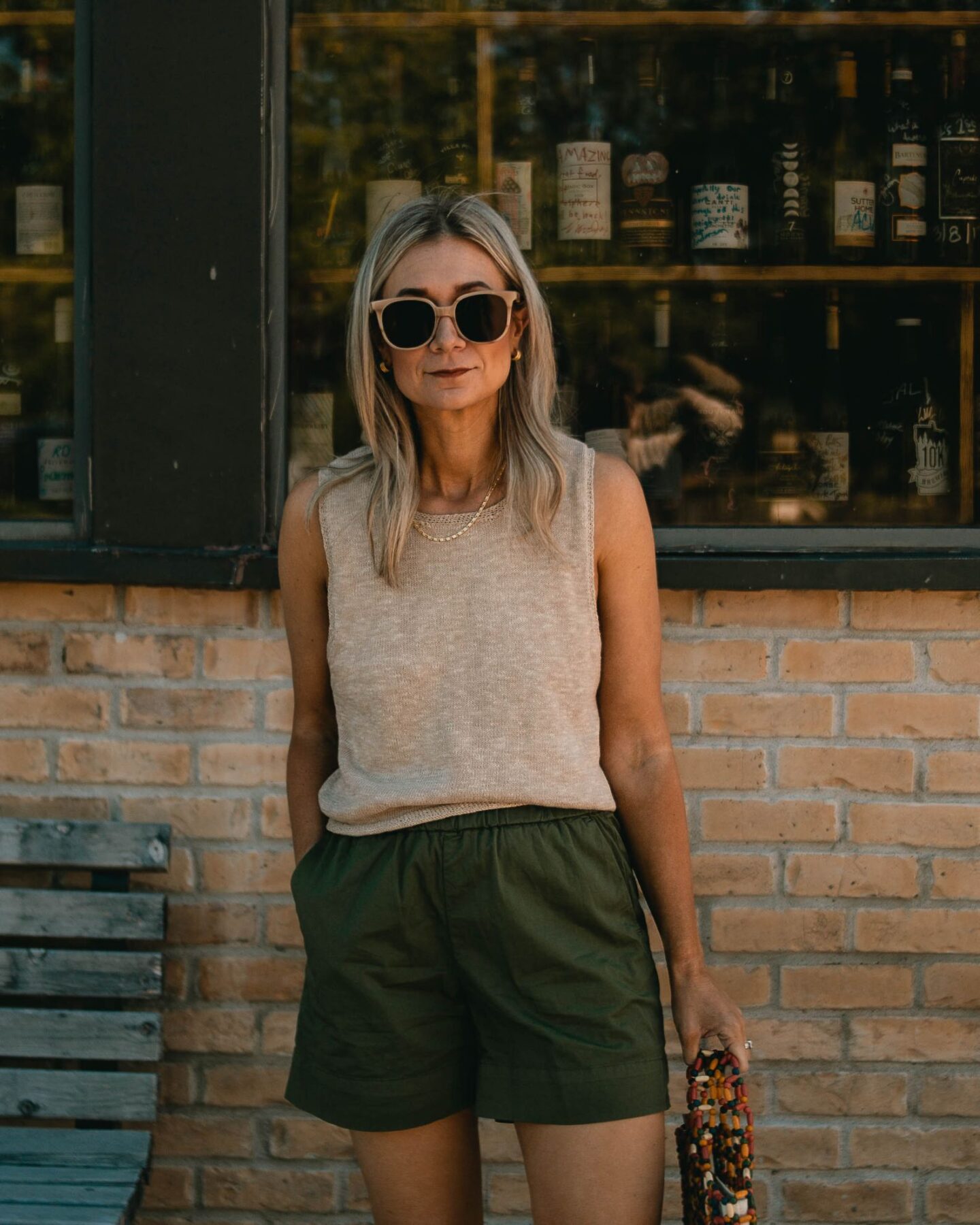 Karin Emily wears her Everlane favorites: a pair of olive green easy shorts