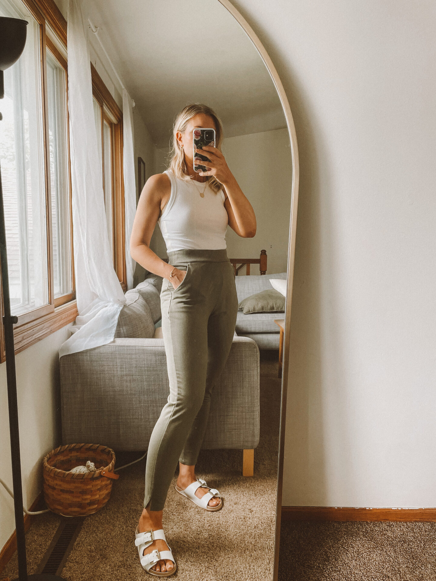 Karin Emily shares a Target try on with a white tank top and green sweat pant joggers