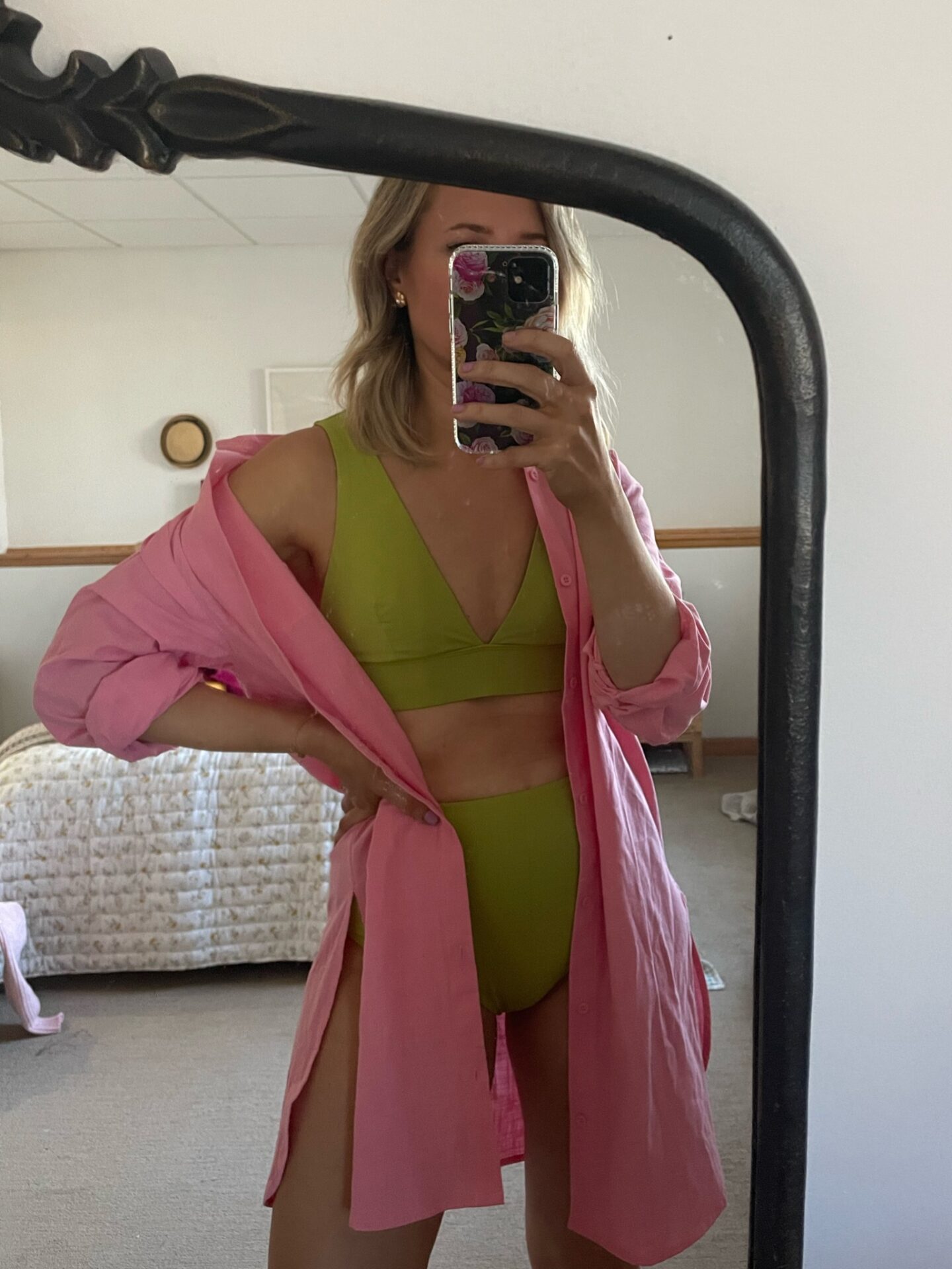 Karin Emily wears her Everlane favorites: a lime green bikini with high waisted bottoms