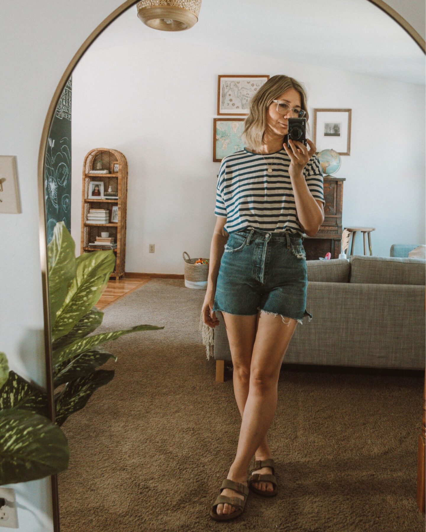 Karin Emily wears her favorite denim shorts with a striped tee