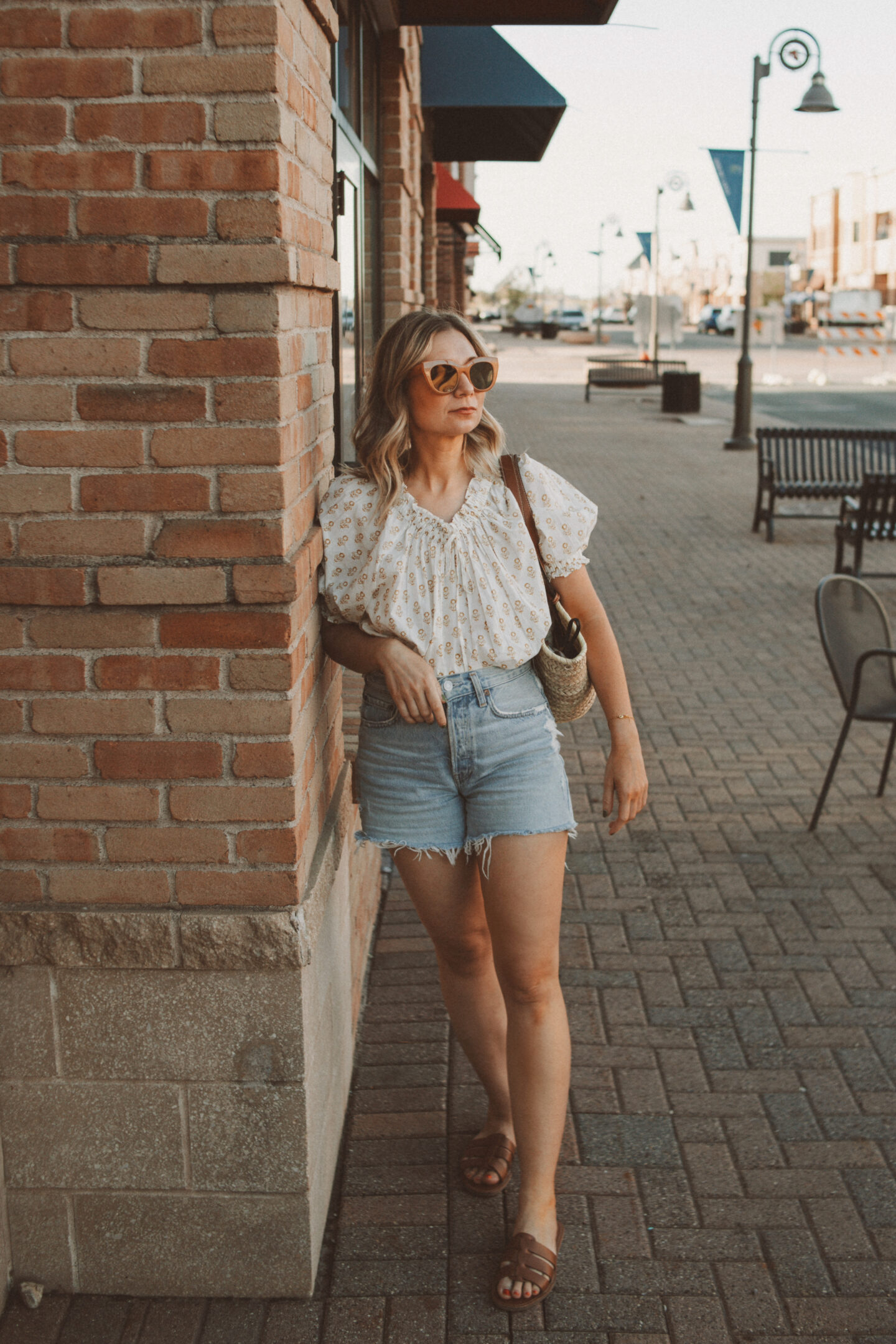 Karin Emily wears her favorite denim shorts with a white blouse