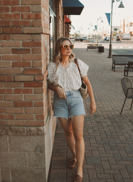 Karin Emily wears her favorite denim shorts with a white blouse