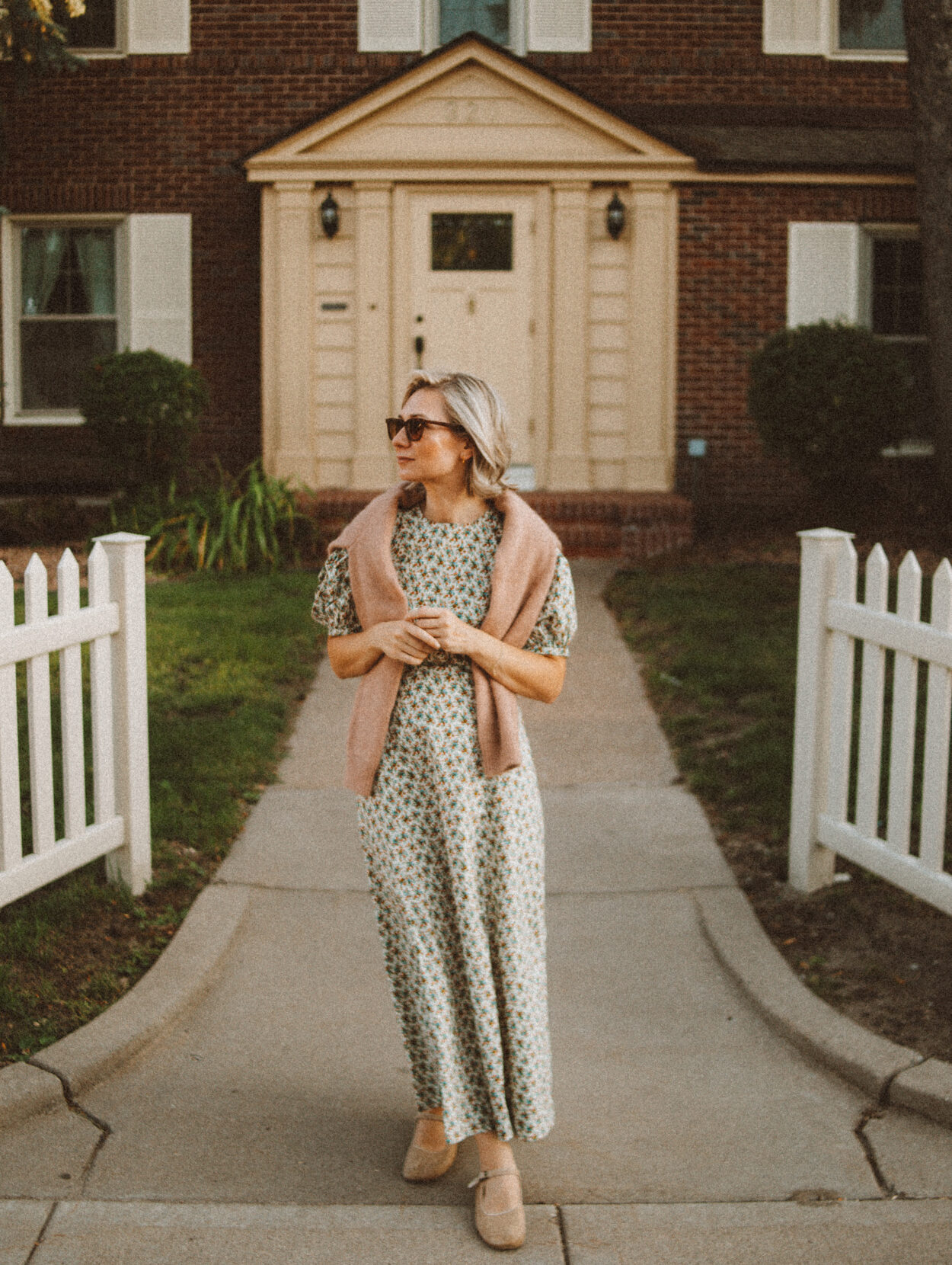 Karin Emily wears her doen favorites for fall: a floral maxi dress and cardigan sweater