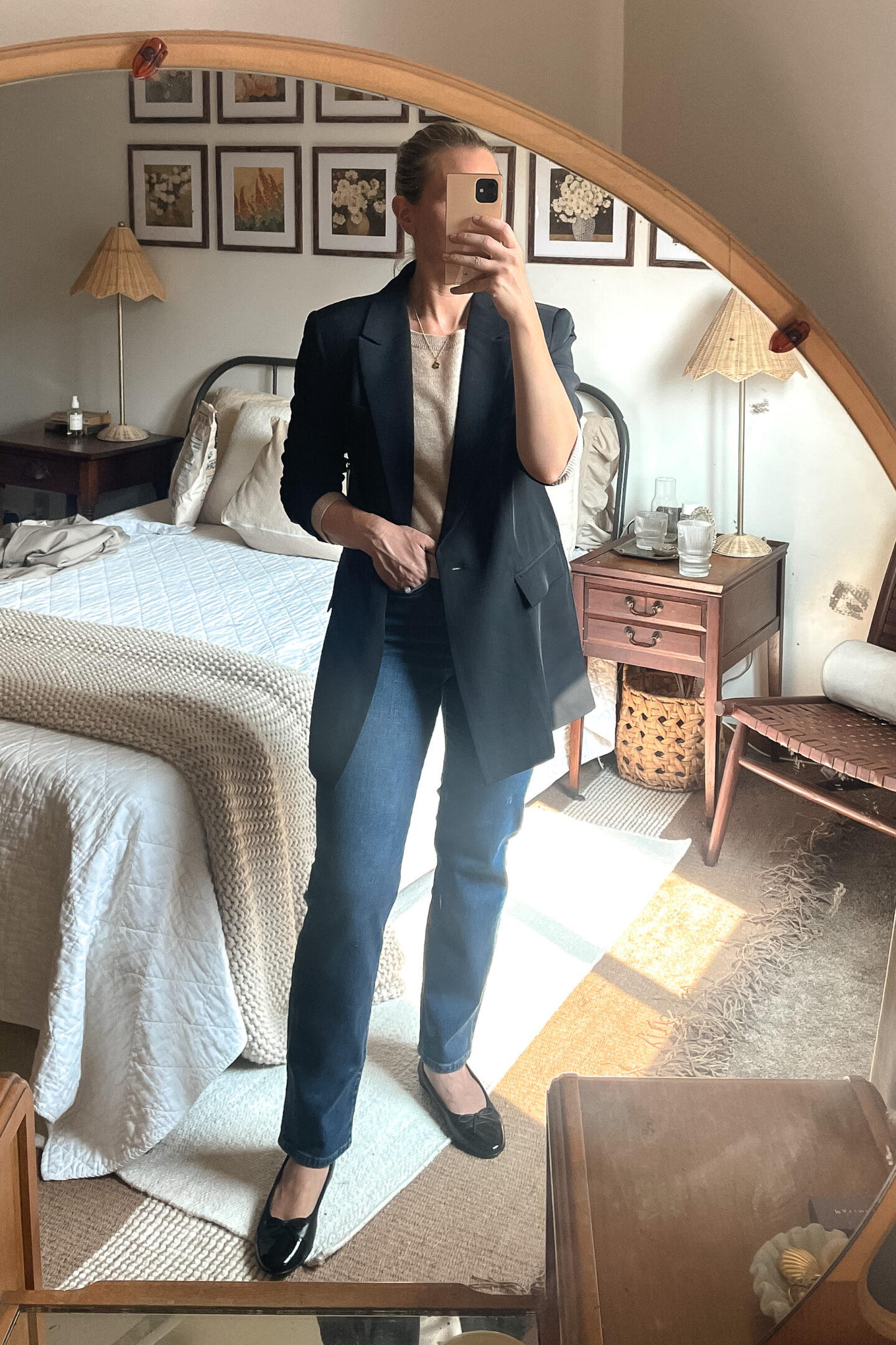 Karin Emily shares her Nordstrom anniversary sale finds in a mirror selfie in her bedroom 