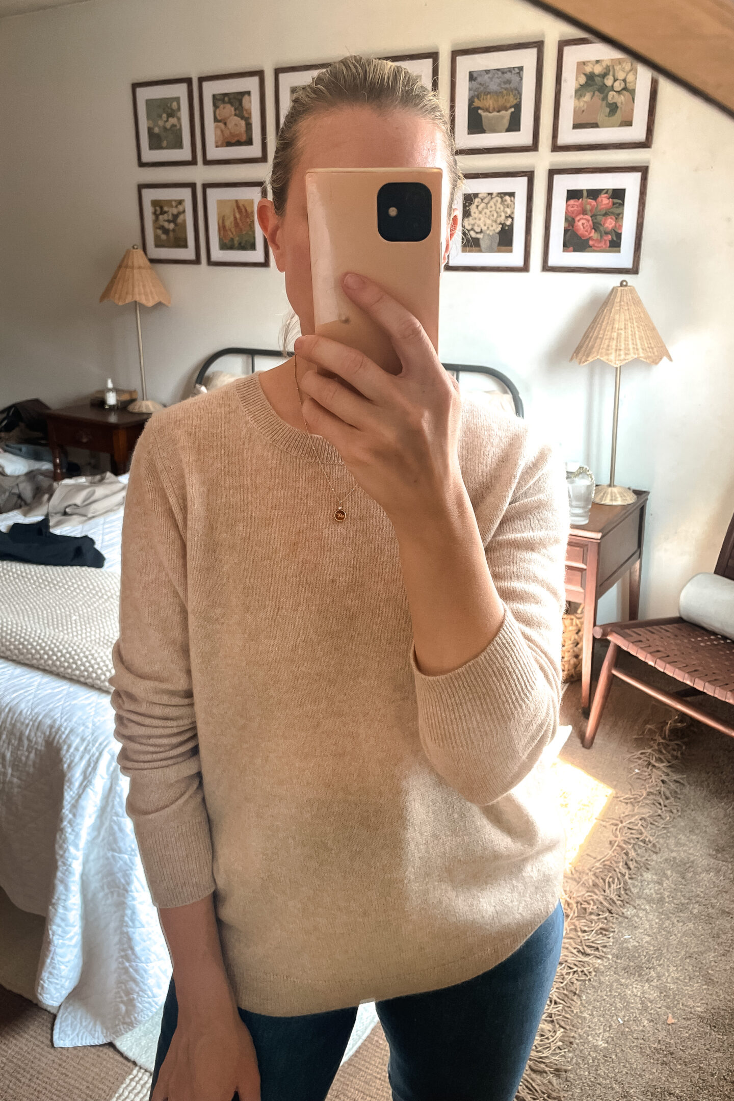 Karin Emily shares her Nordstrom anniversary sale finds in a mirror selfie in her bedroom 