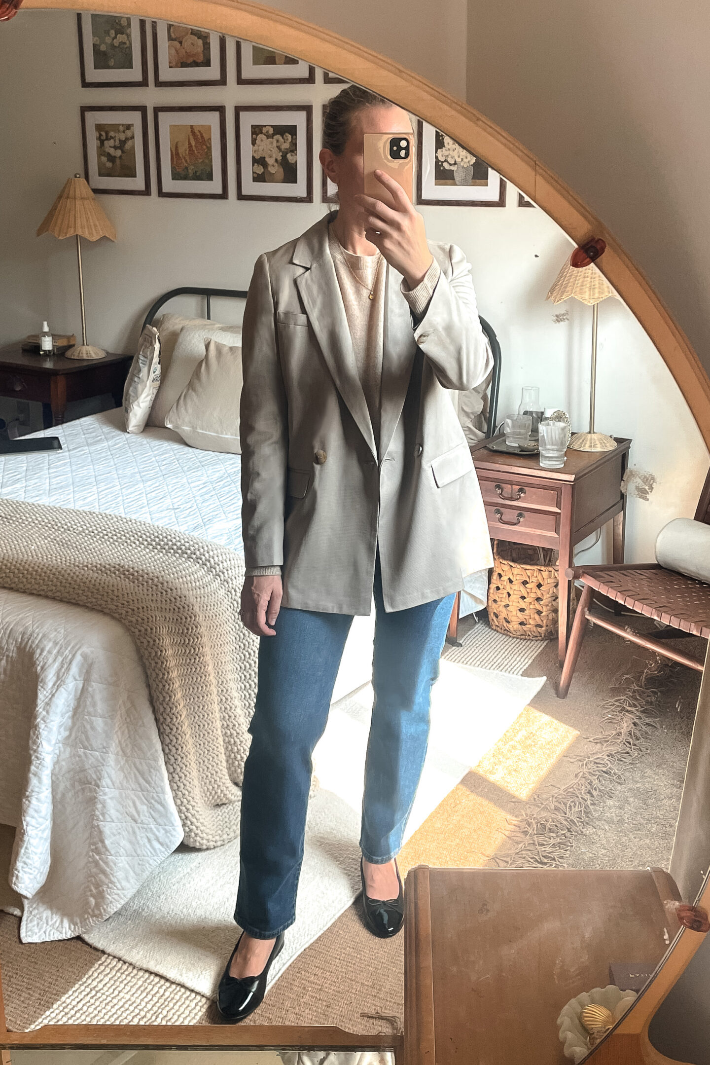 Karin Emily shares her Nordstrom anniversary sale finds in a mirror selfie in her bedroom 