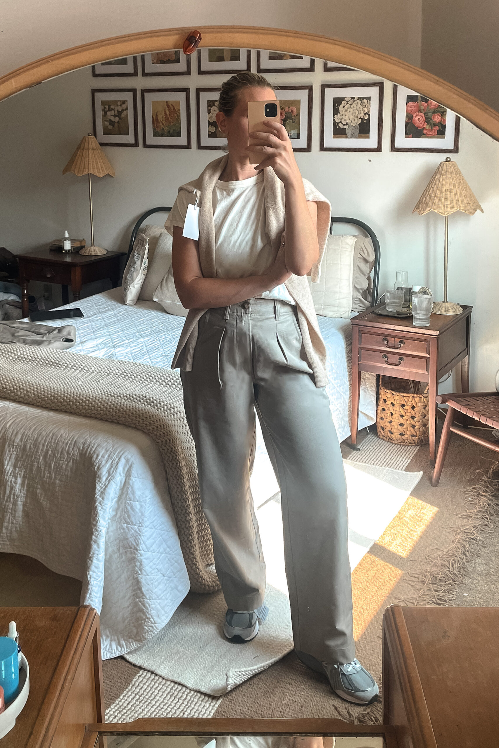 Karin Emily shares her Nordstrom anniversary sale finds in a mirror selfie in her bedroom 