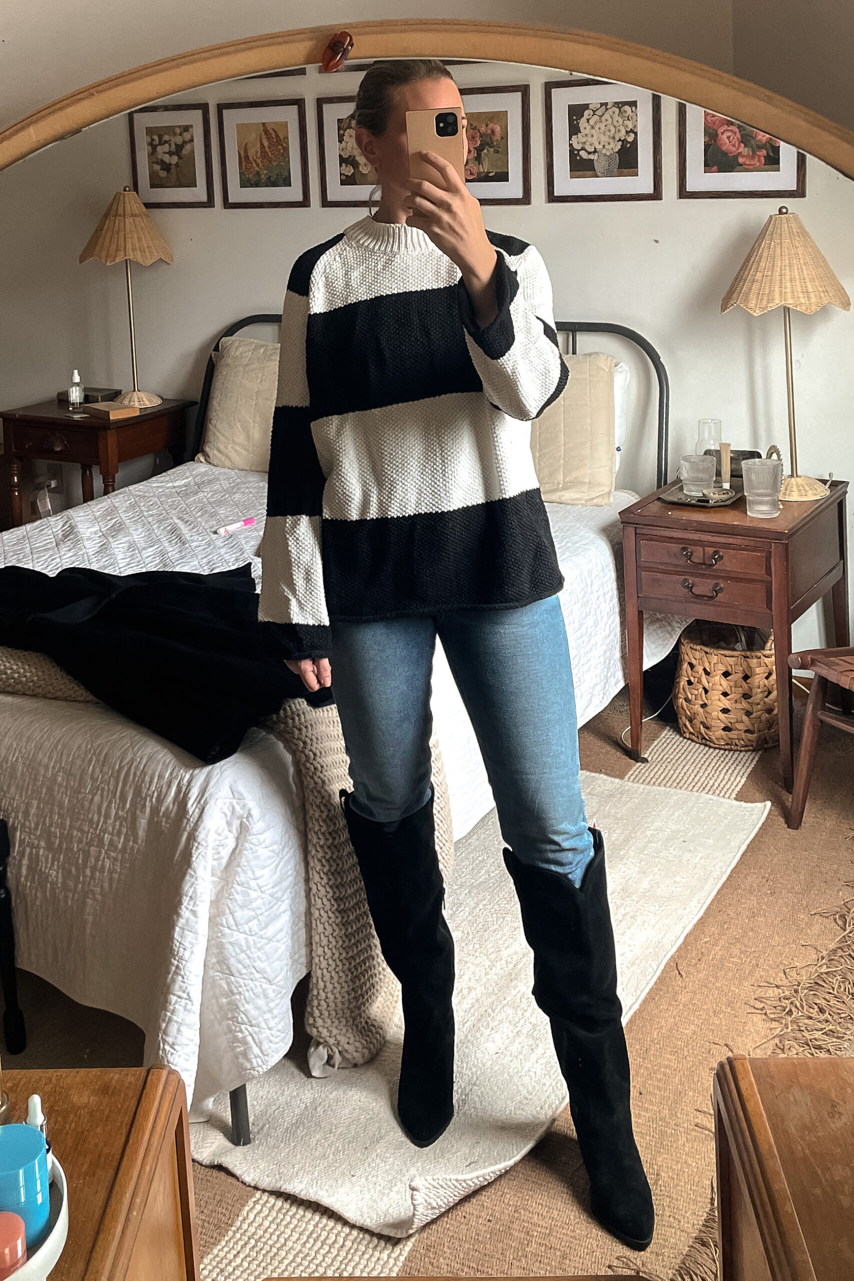 Karin Emily shares her Nordstrom anniversary sale finds in a mirror selfie in her bedroom 