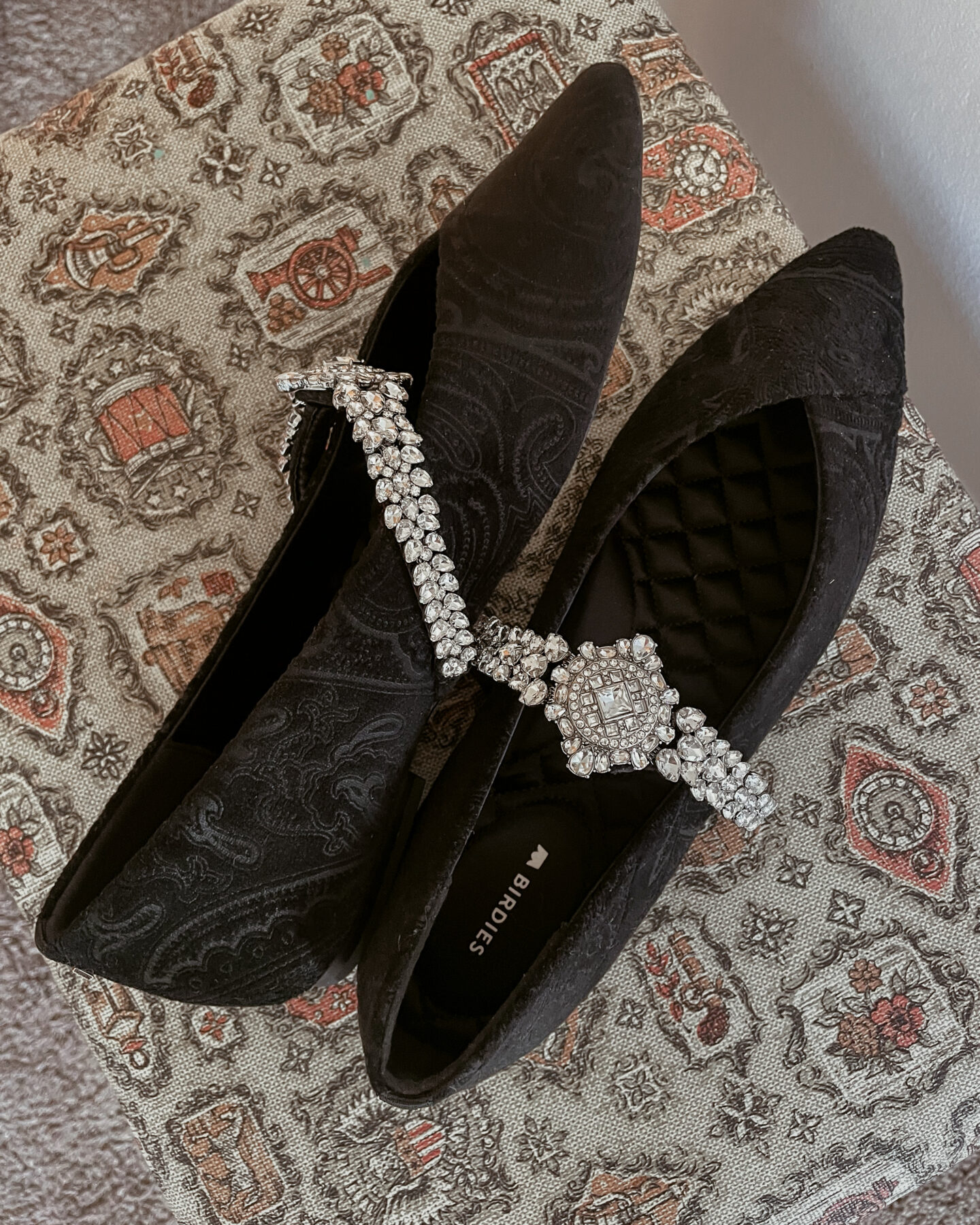 A pair of sparkly jeweled encrusted black flats from one of the small businesses I love to support