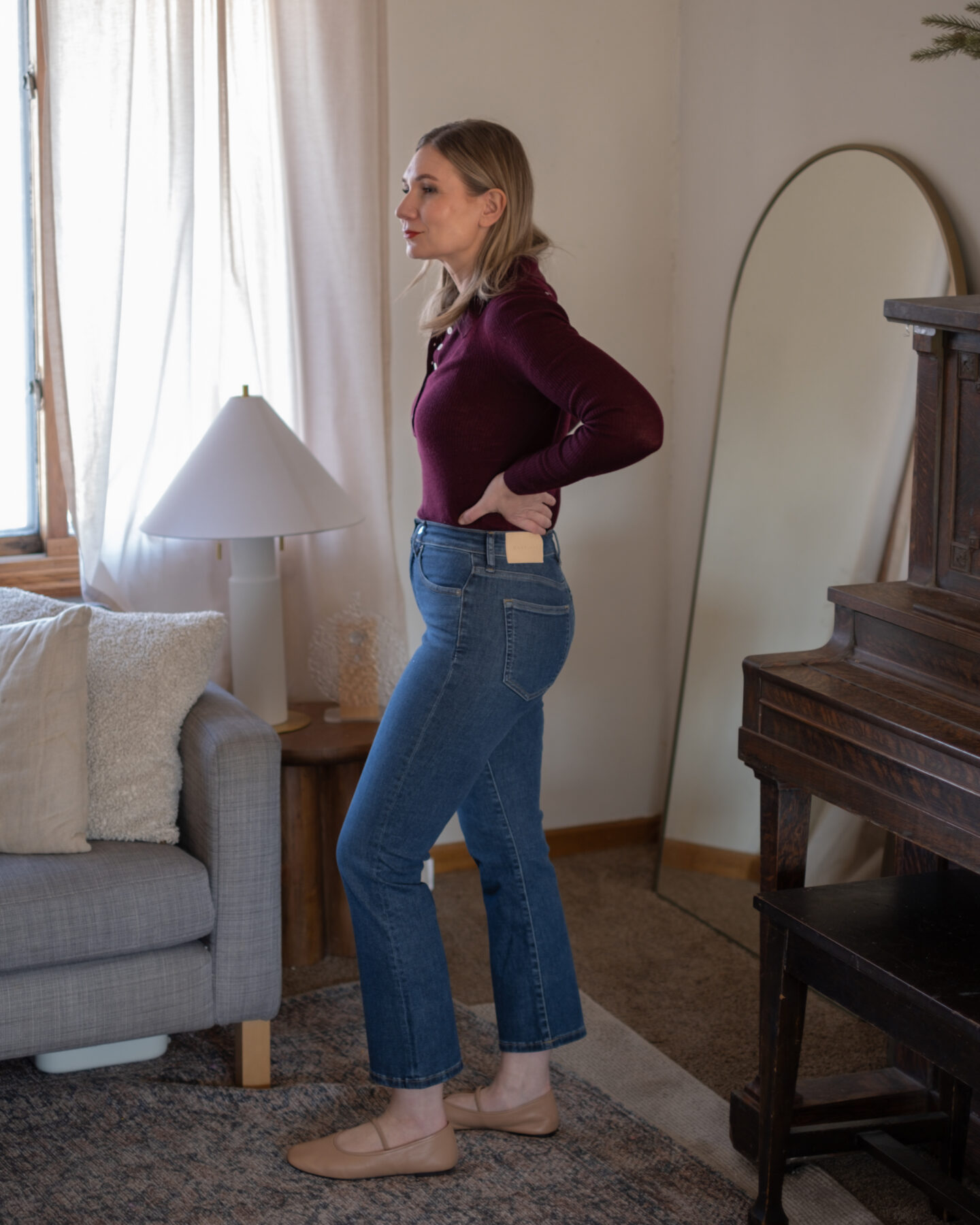 Karin Emily wears a pair of Everlane Denim as she tries them on for her Everlane Denim Review