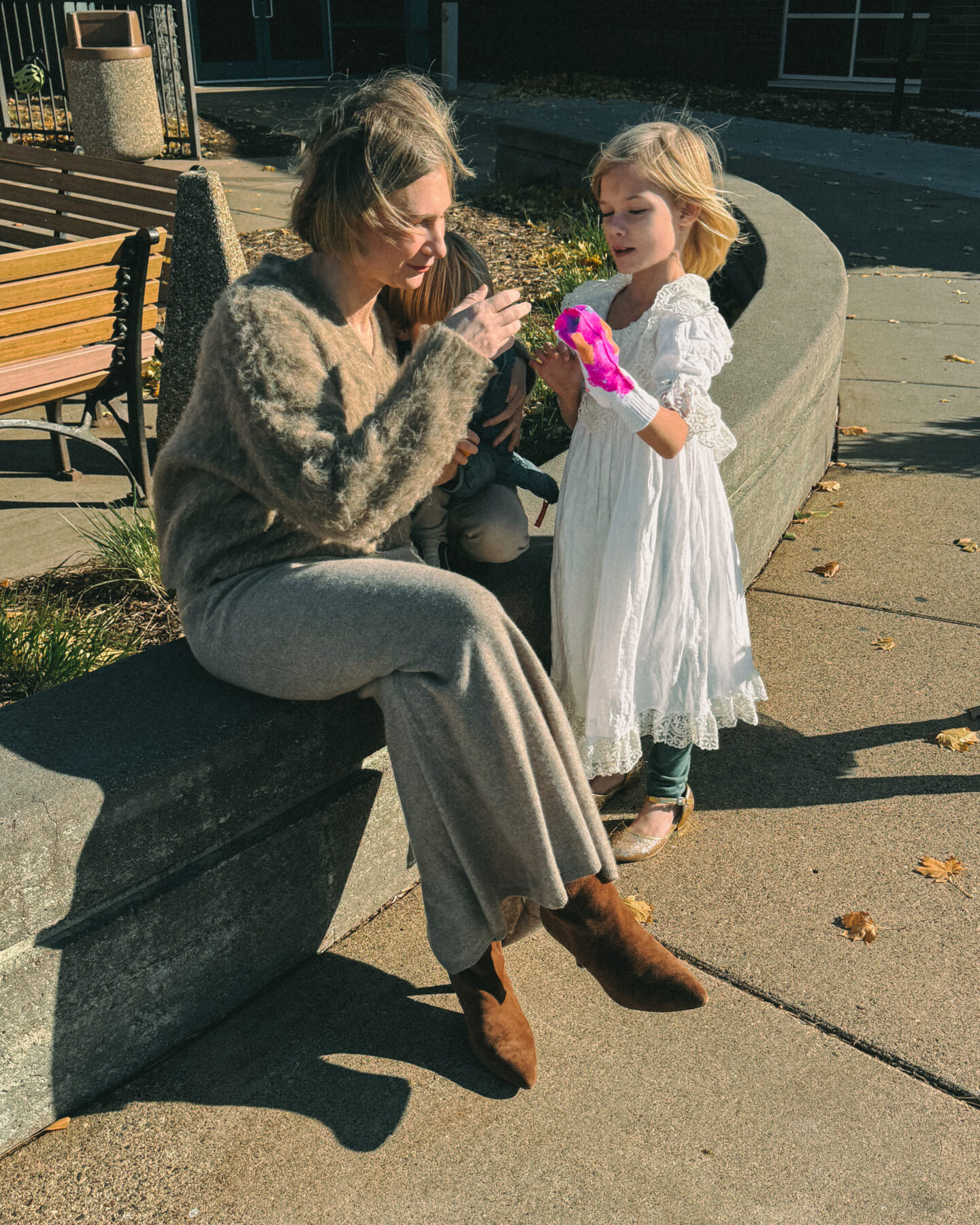 Karin Rambo hangs out with her kids while wearing a sweater skirt and shares Black Friday Sales